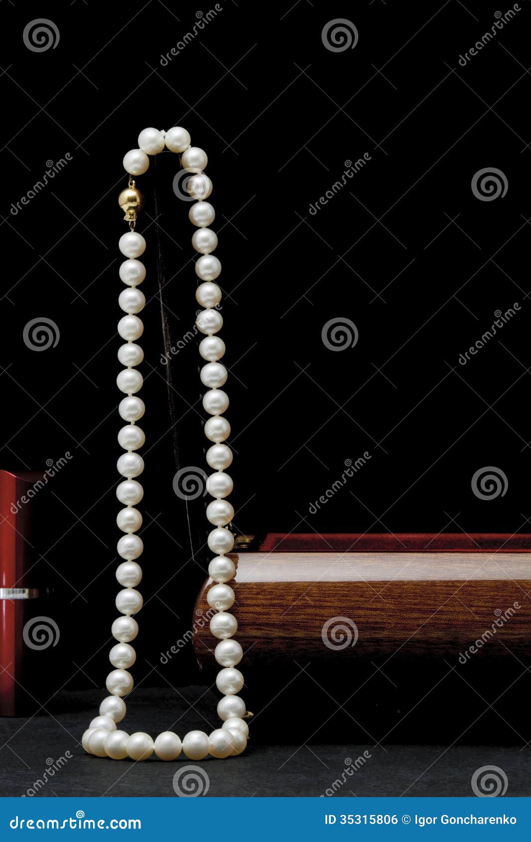 Sunglasses and Pearl Necklace on Wooden Background Stock Photo - Alamy