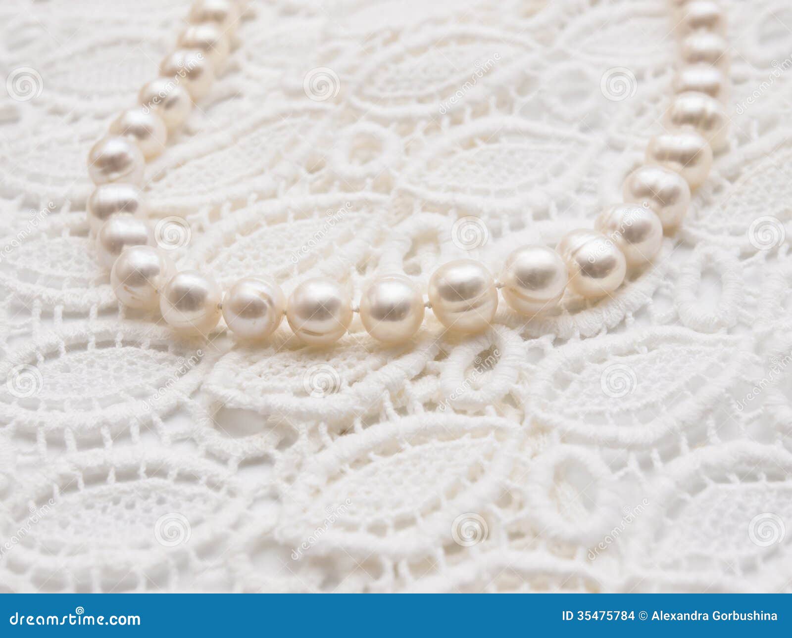 Pearl Necklace on White Lace Stock Photo Image of pearls, elegant
