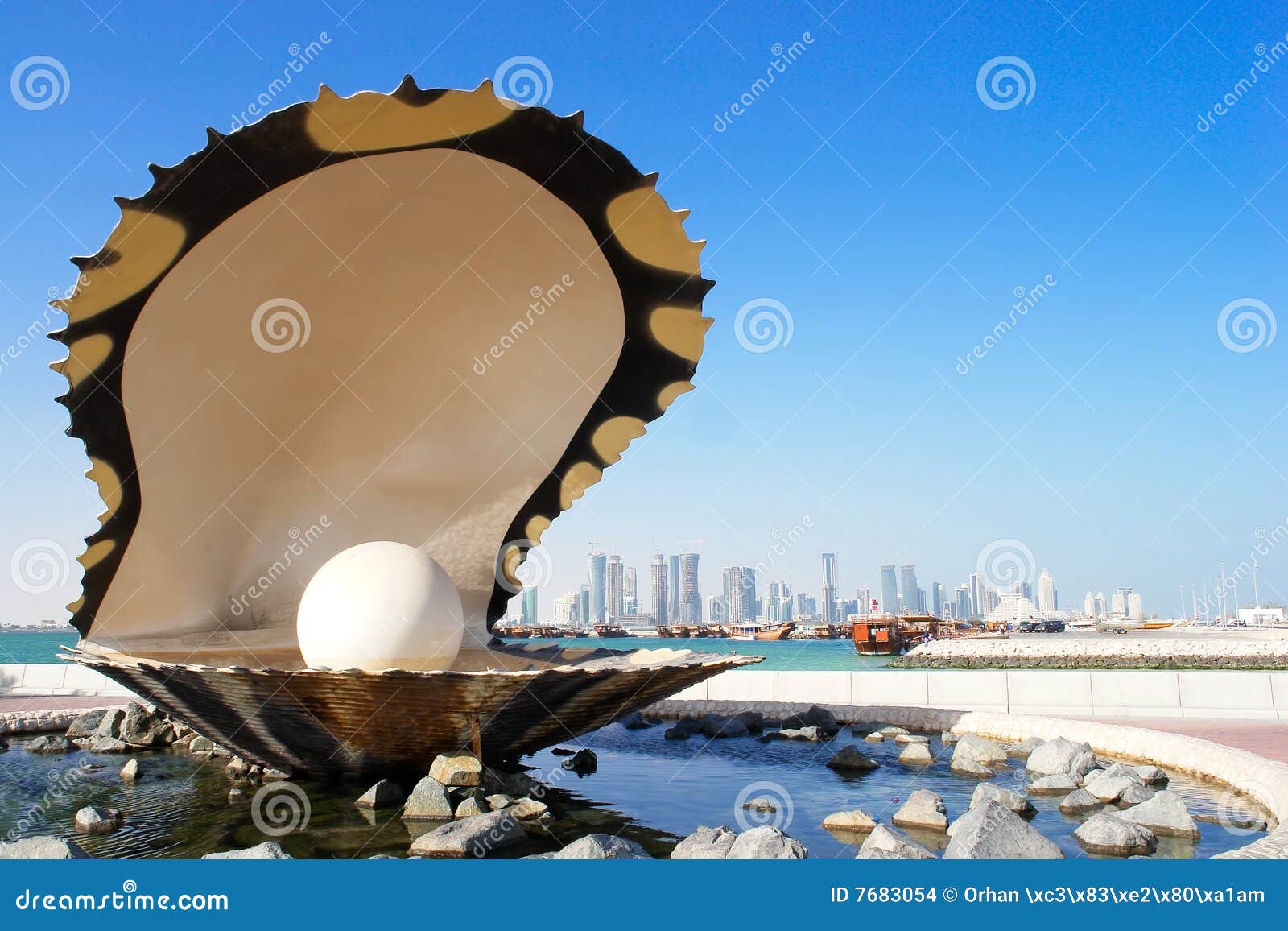 pearl and oyster fountain in corniche - doha qatar