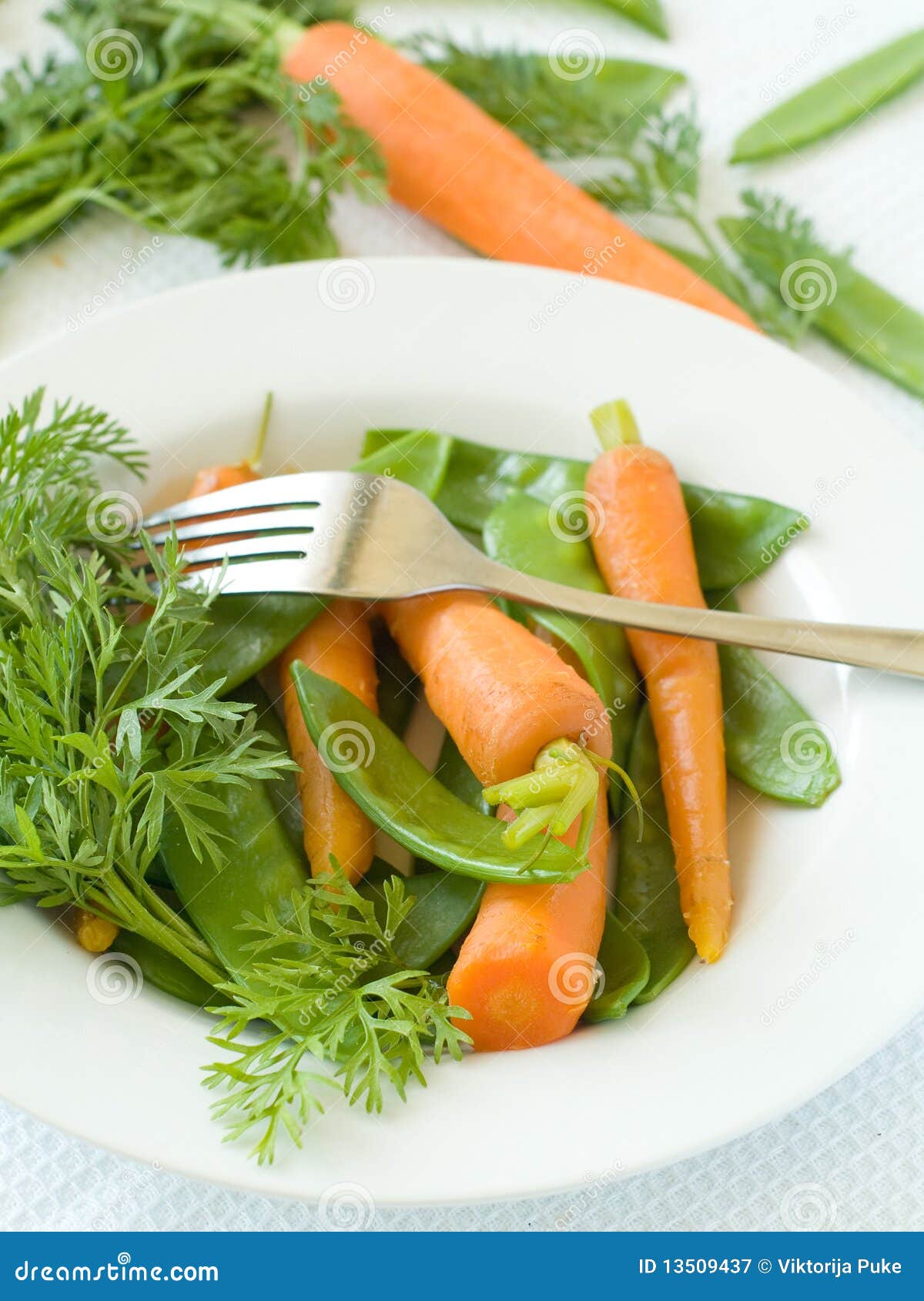 Peas and carrot. stock image. Image of food, vegan, plate 13509437