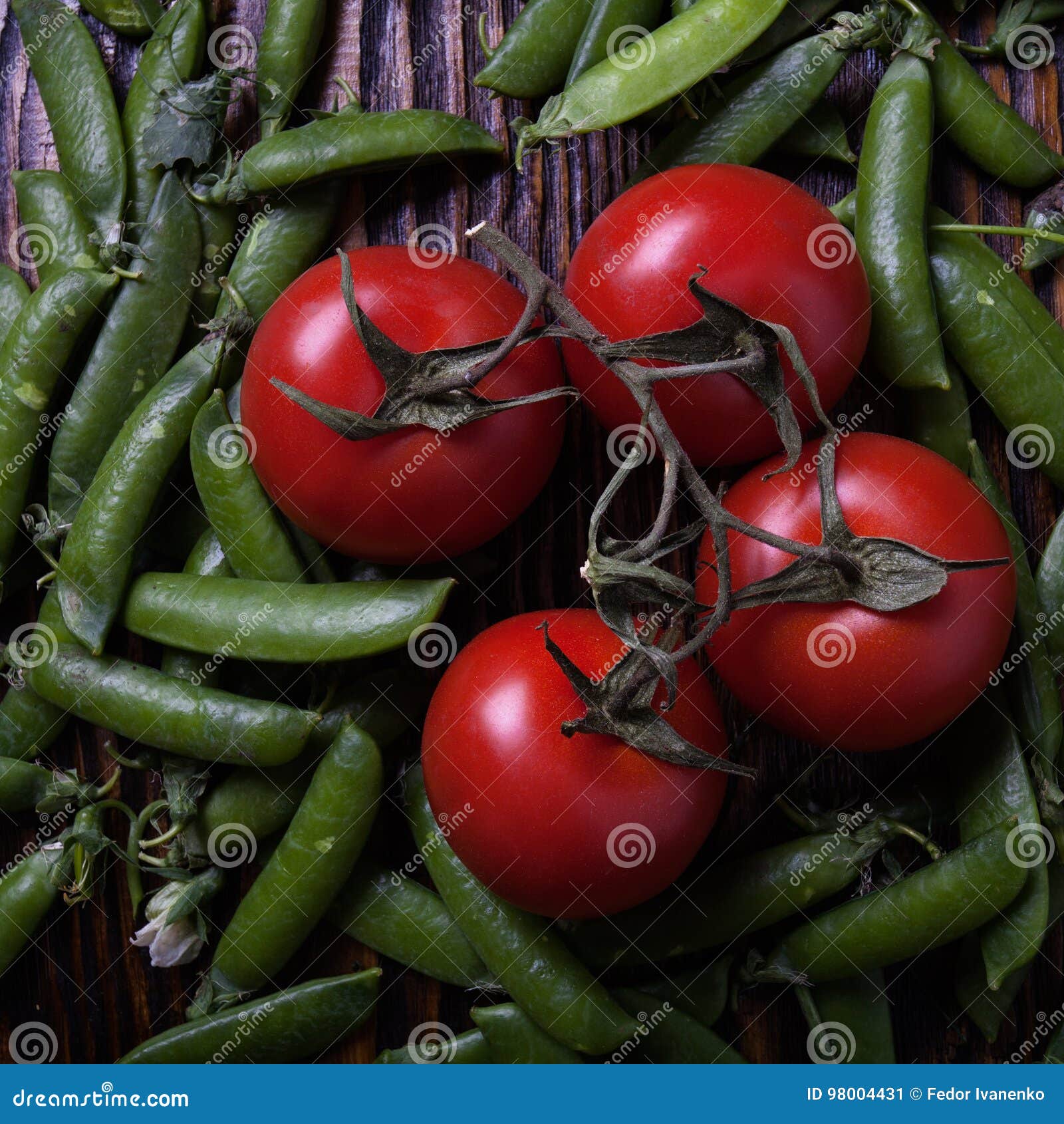 Peas and tomatoes stock image. Image of dark, colors 98004431