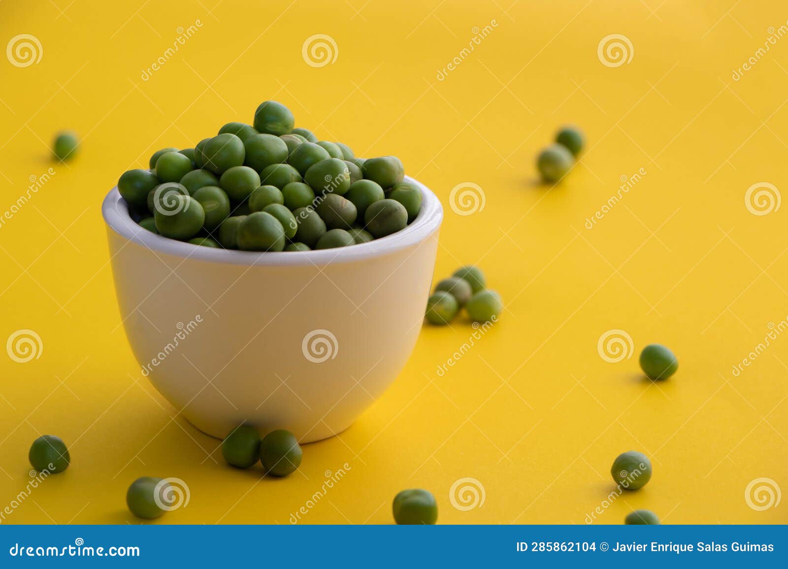 peas in a white bowl