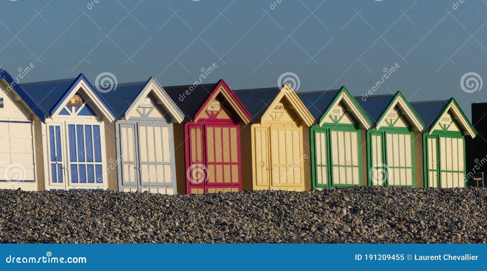pebbles, beach and huts