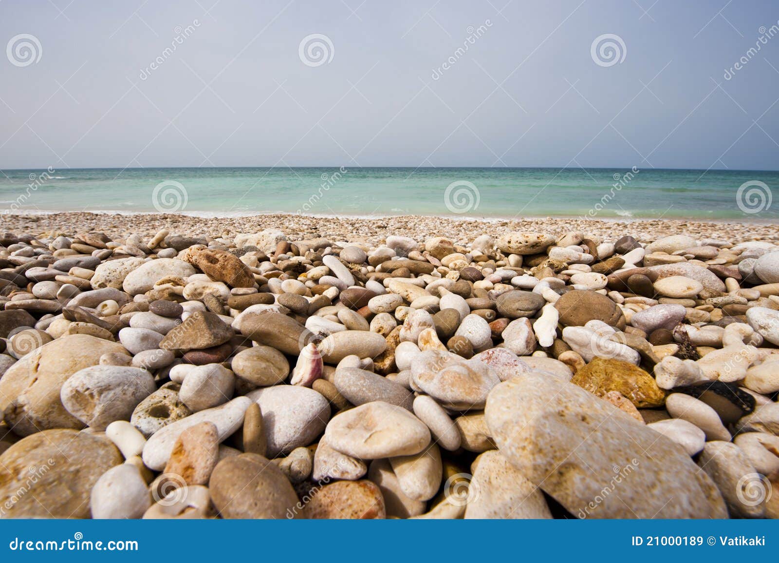 Pebble beach, Oman stock image. Image of arabia, tourist 21000189