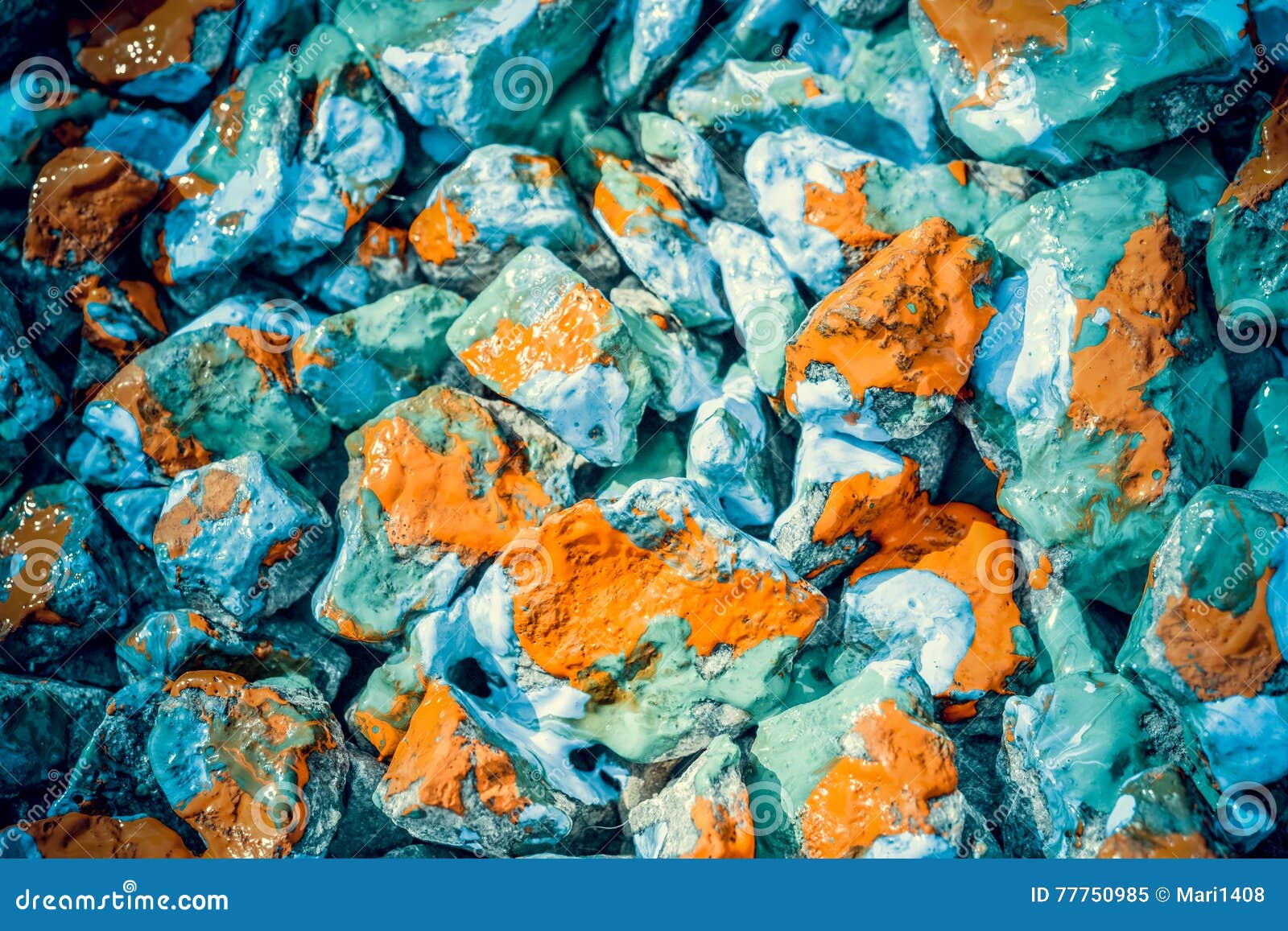pebbles painted bright colored paint