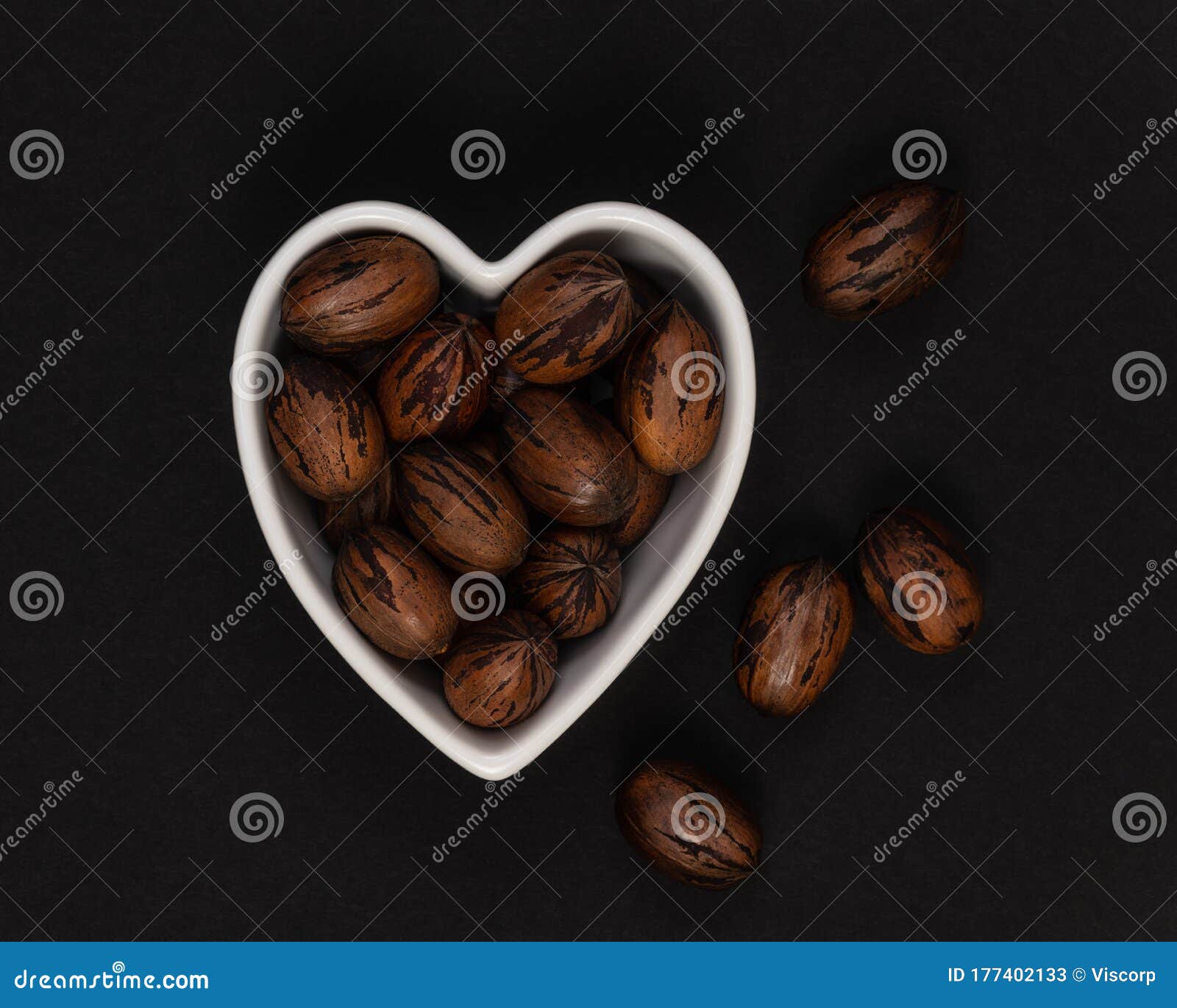 Pecan Nuts in a Heart Shaped Bowl Stock Image Image of dark, black