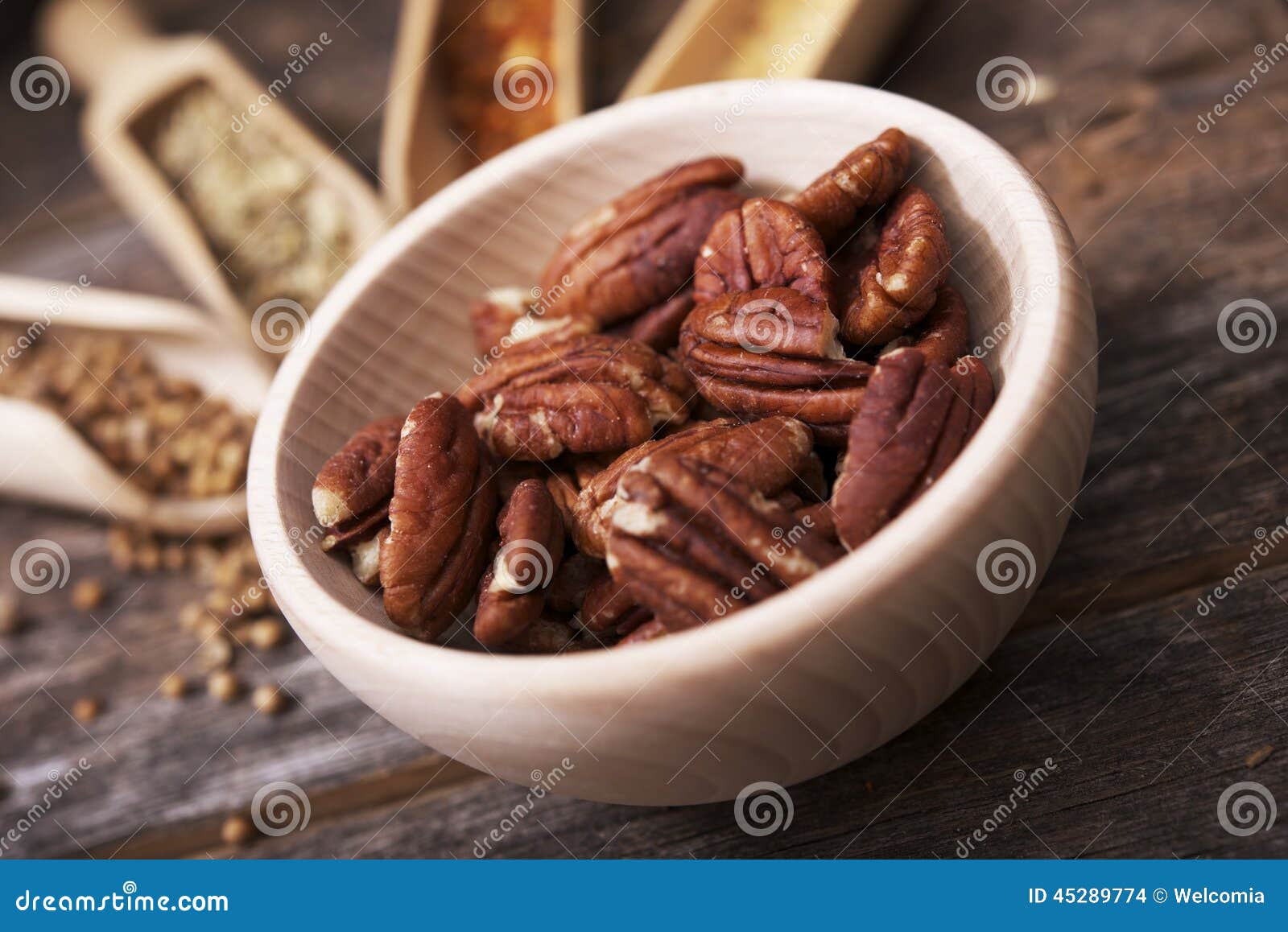 Pecans in the Wooden Bowl stock photo. Image of antioxidant 45289774