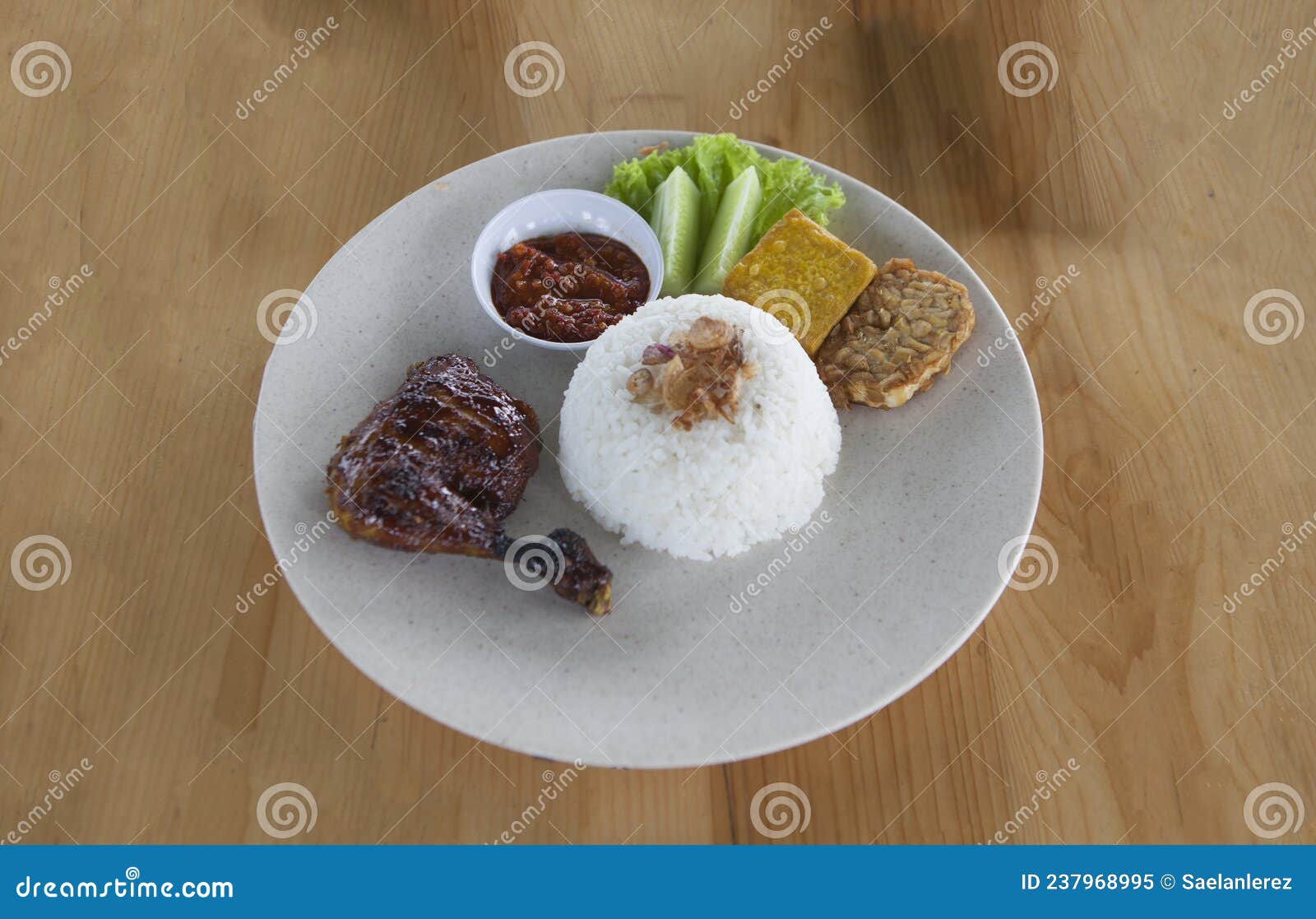 Pecel Ayam Or Ayam Penyet Is A Traditional Indonesian Fried Chicken