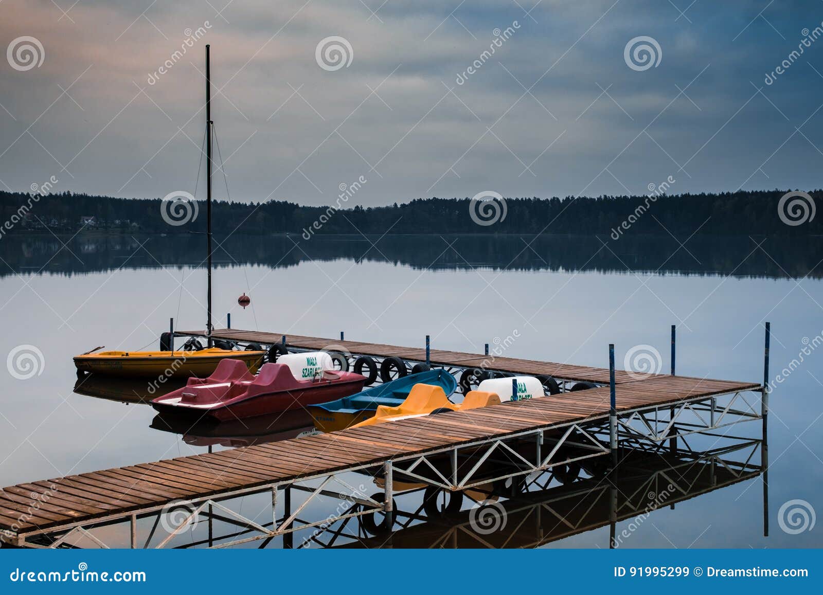 Pedal boats on the lake editorial stock image. Image of lake 91995299