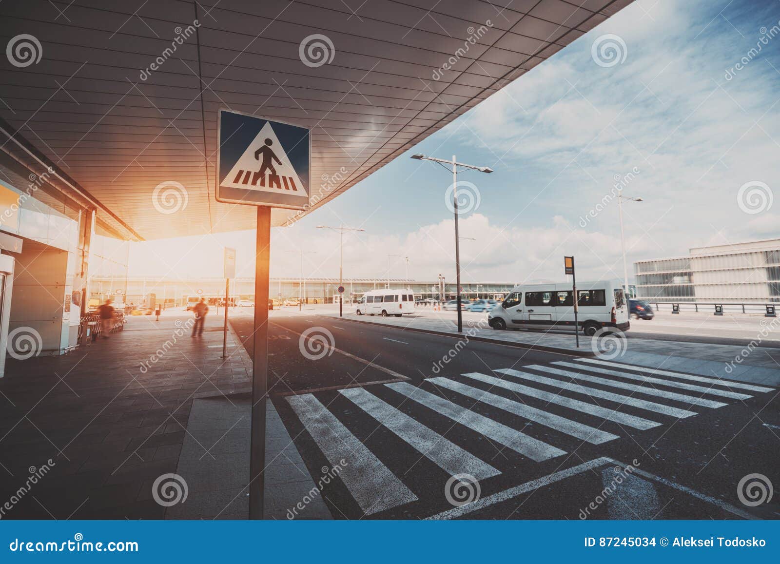 pedestrian crossing next to airport entrance