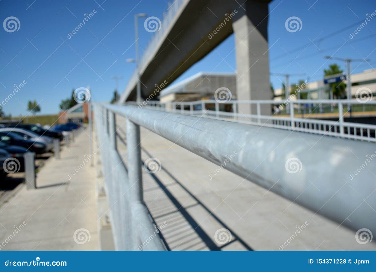 Pedestrian Walkway by Train Track Line at City Station Stock Photo ...