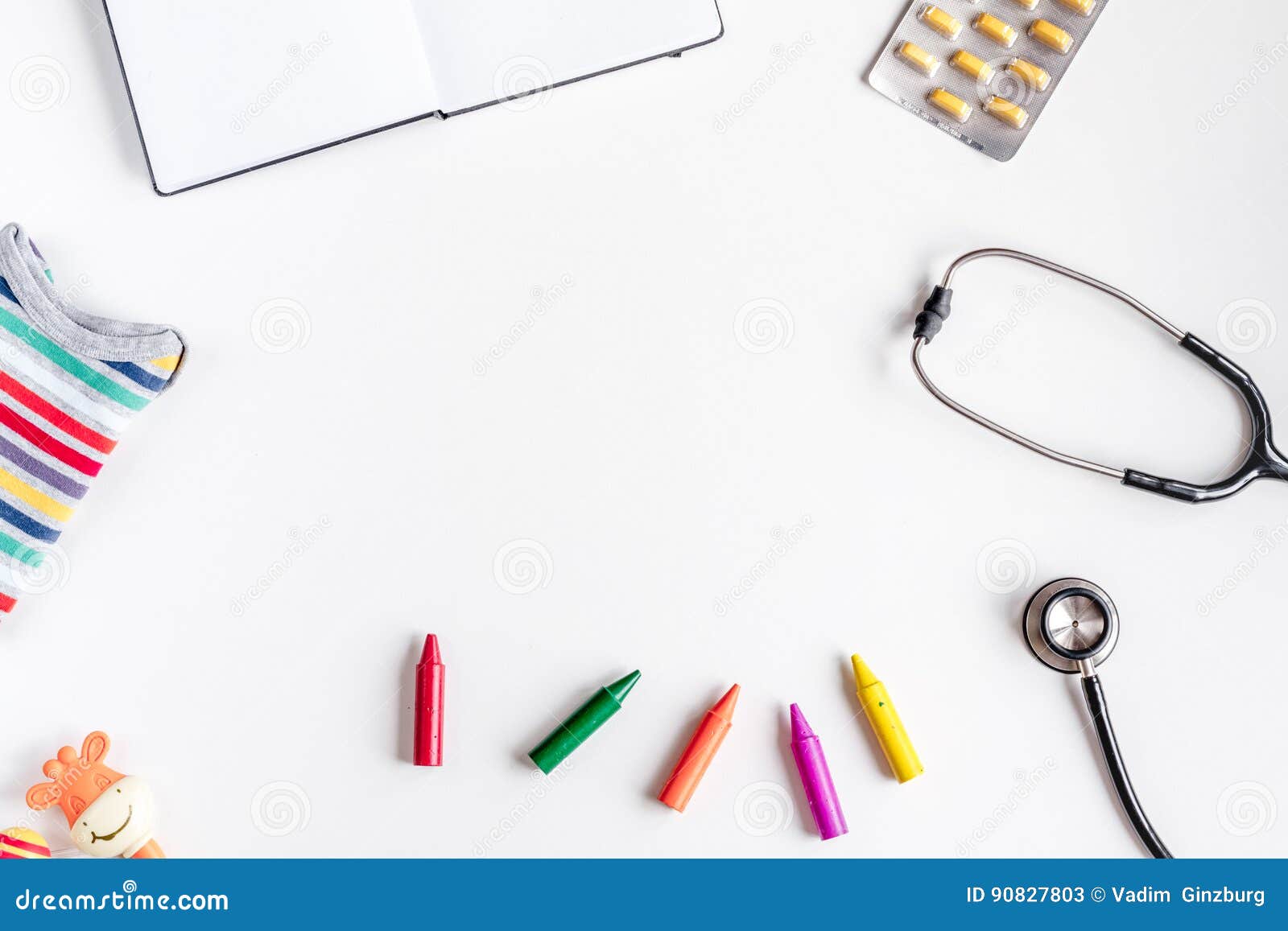 pediatrics equipment with crayons , stethoscope white background top view space for text