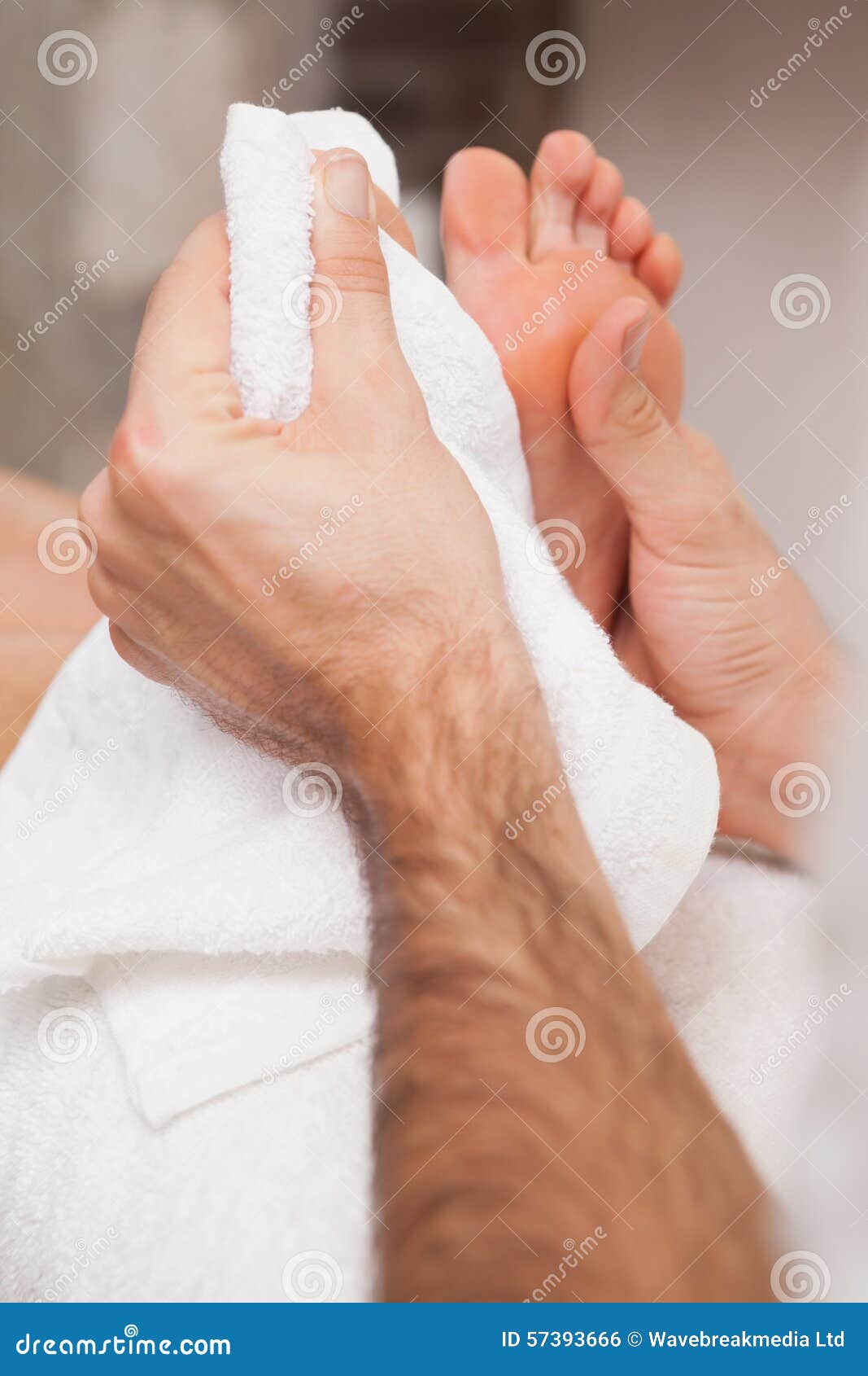 Pedicurist Drying a Customers Feet Stock Photo Image of front