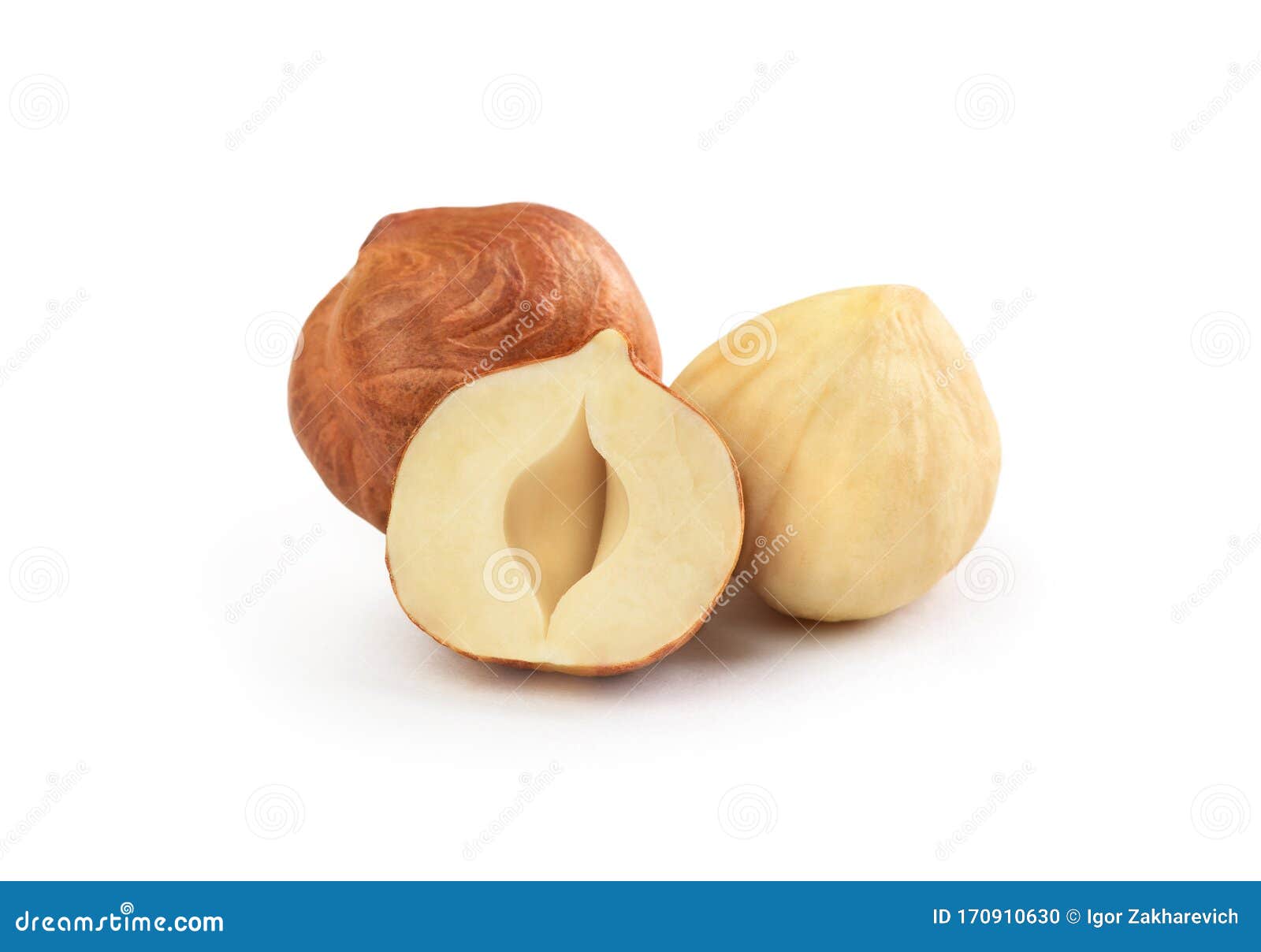 peeled hazelnuts on a white background