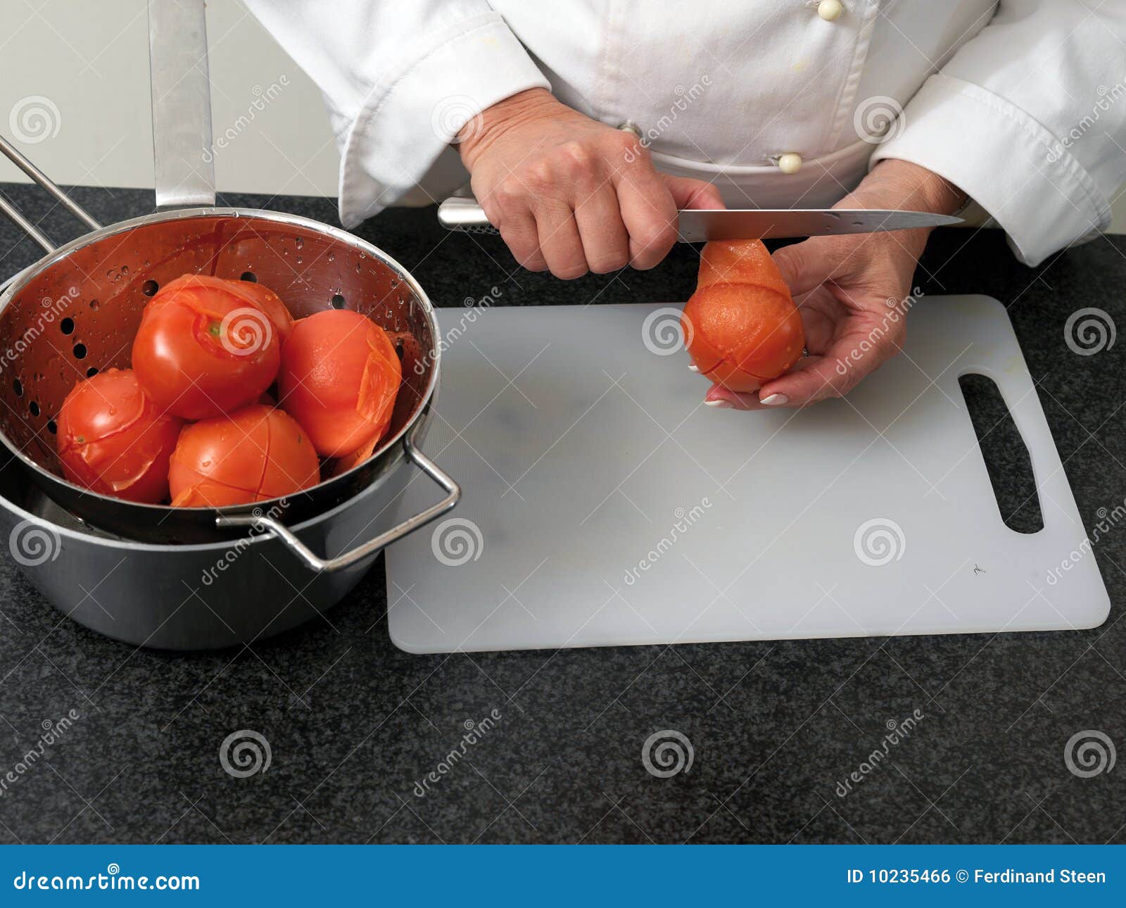 Peeling tomatos stock photo. Image of prepare, chef, boil 10235466