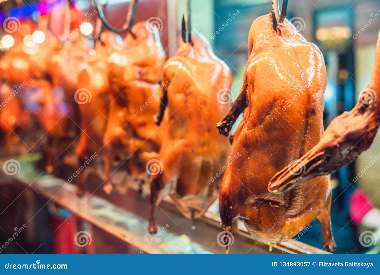 Peking Duck is Roasting in the Oven, Preparing To Serve on the Cost