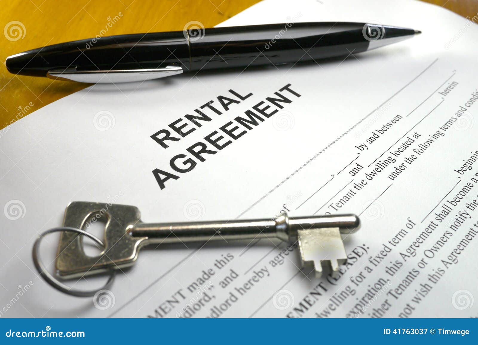 Pen and Key on Rental Agreement Stock Image Image of rental, contract