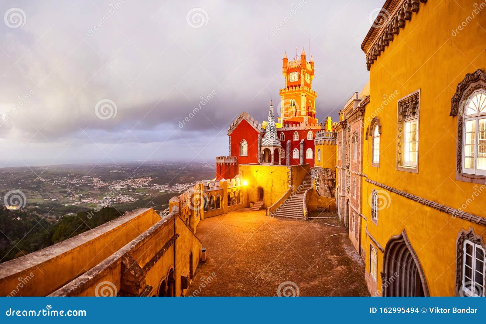 pena palace in sintra, lisbon, portugal in the night lights. famous landmark. most beautiful castles in europe