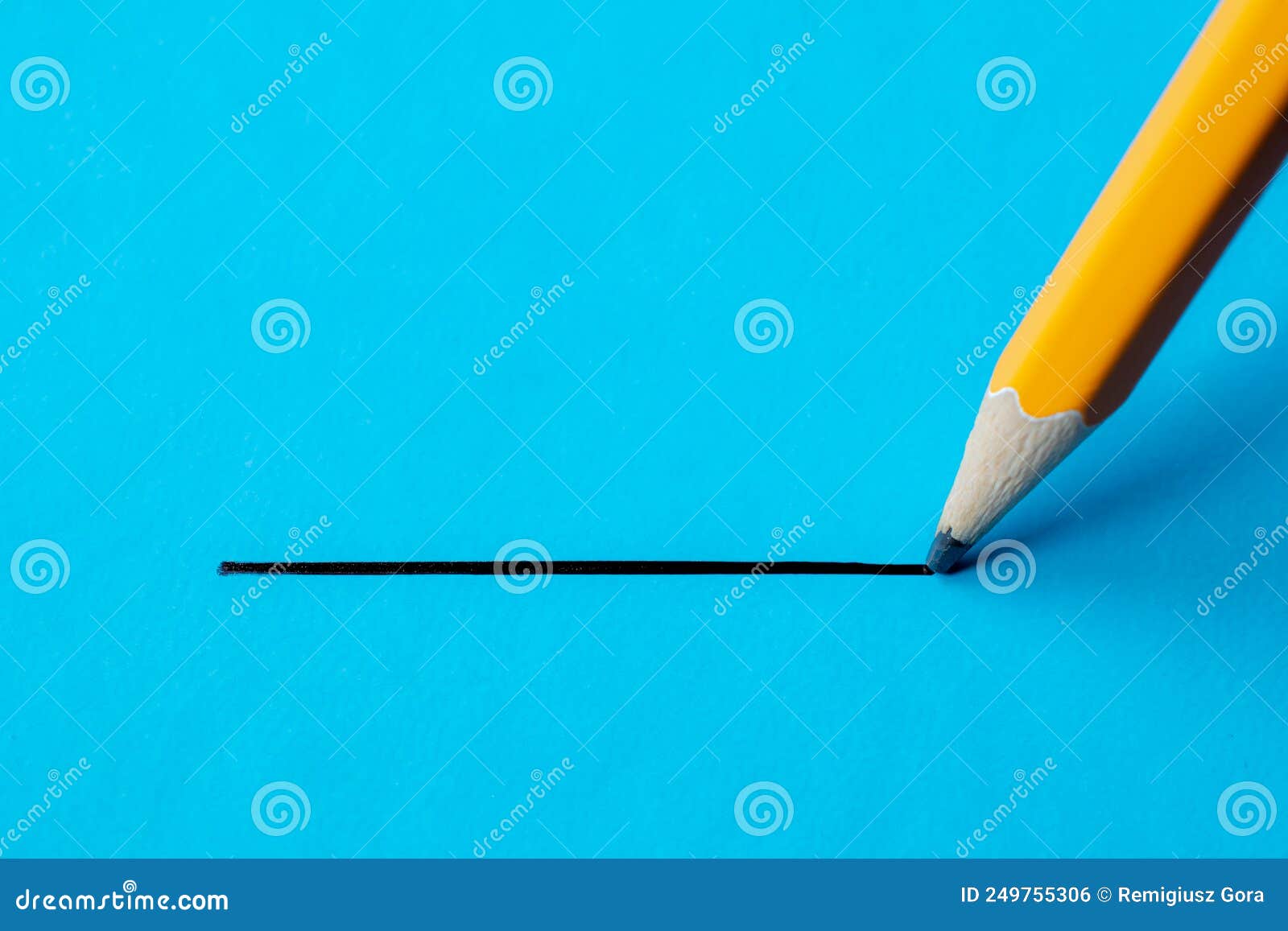 Pencil on a Blue Background with a Stroke Stock Photo Image of macro
