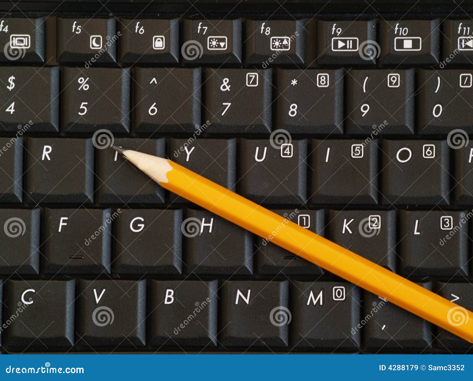 Pencil on Computer Keyboard Stock Image - Image of computing, hand: 4288179