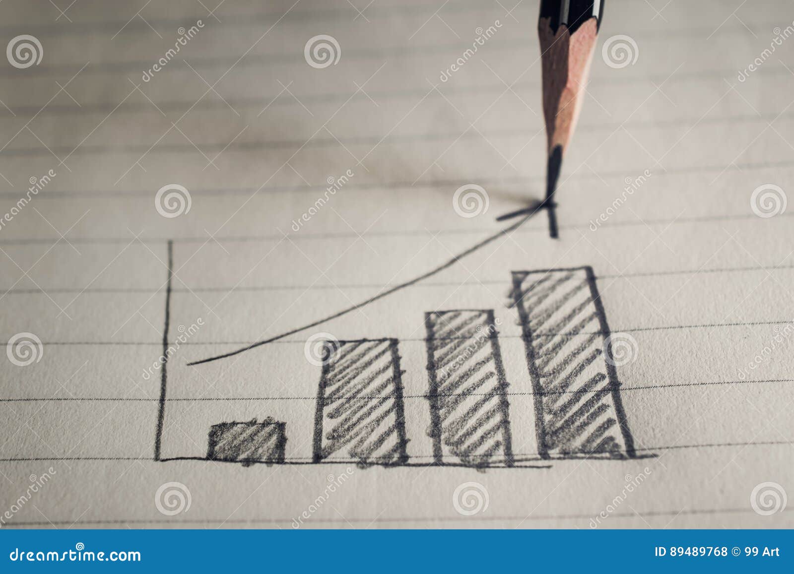 Pencil Drawing Business Graph on Notebook Paper Business Concept Stock