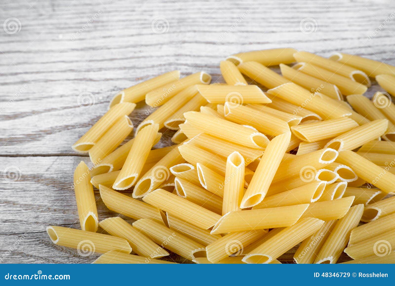 Pene pasta pile stock image. Image of white, text, dinner - 48346729