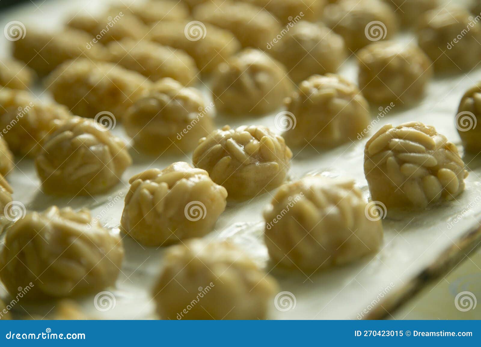 penellets. small sweets of various s, made from almond and potato dough