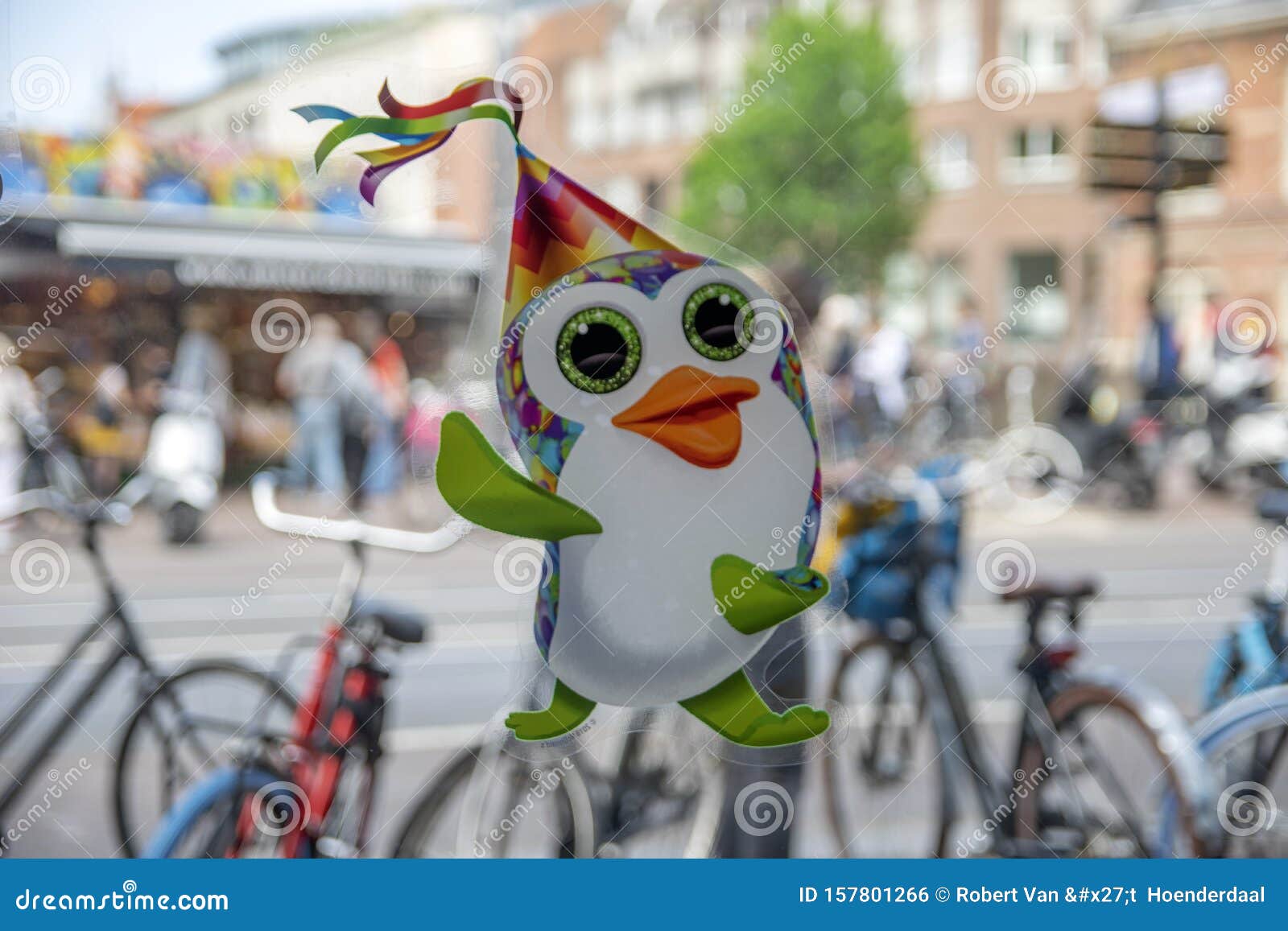 Penguin Sticker on a McDonalds Restaurant Window at Amsterdam the