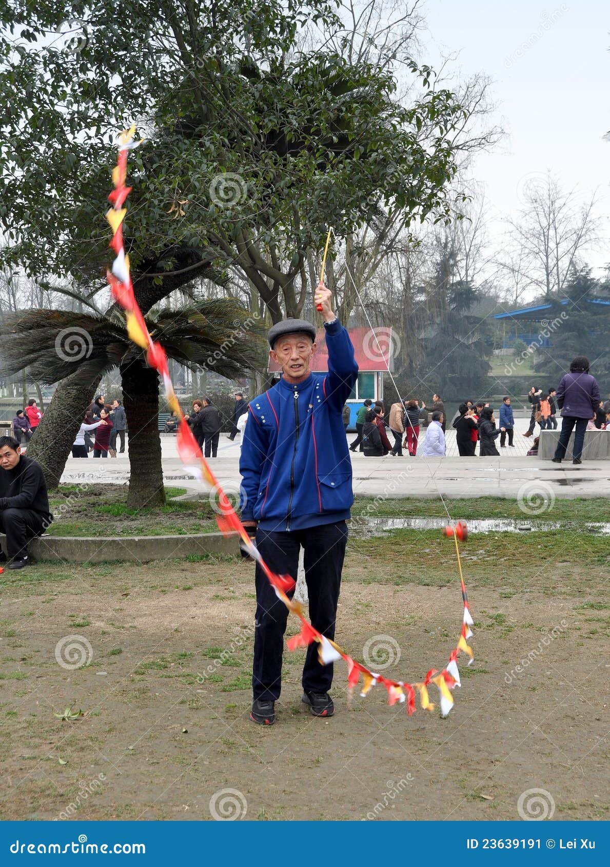 Pengzhou, China Man Spinning Top Editorial Photo Image of orange