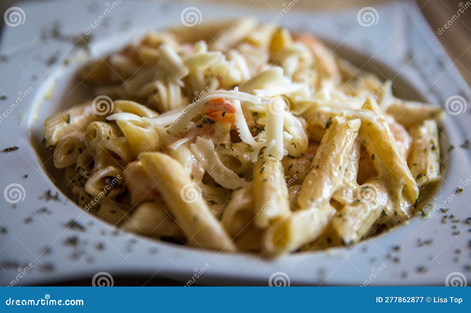 Penne Alfredo with Shrimp stock image. Image of restuarant 277862877