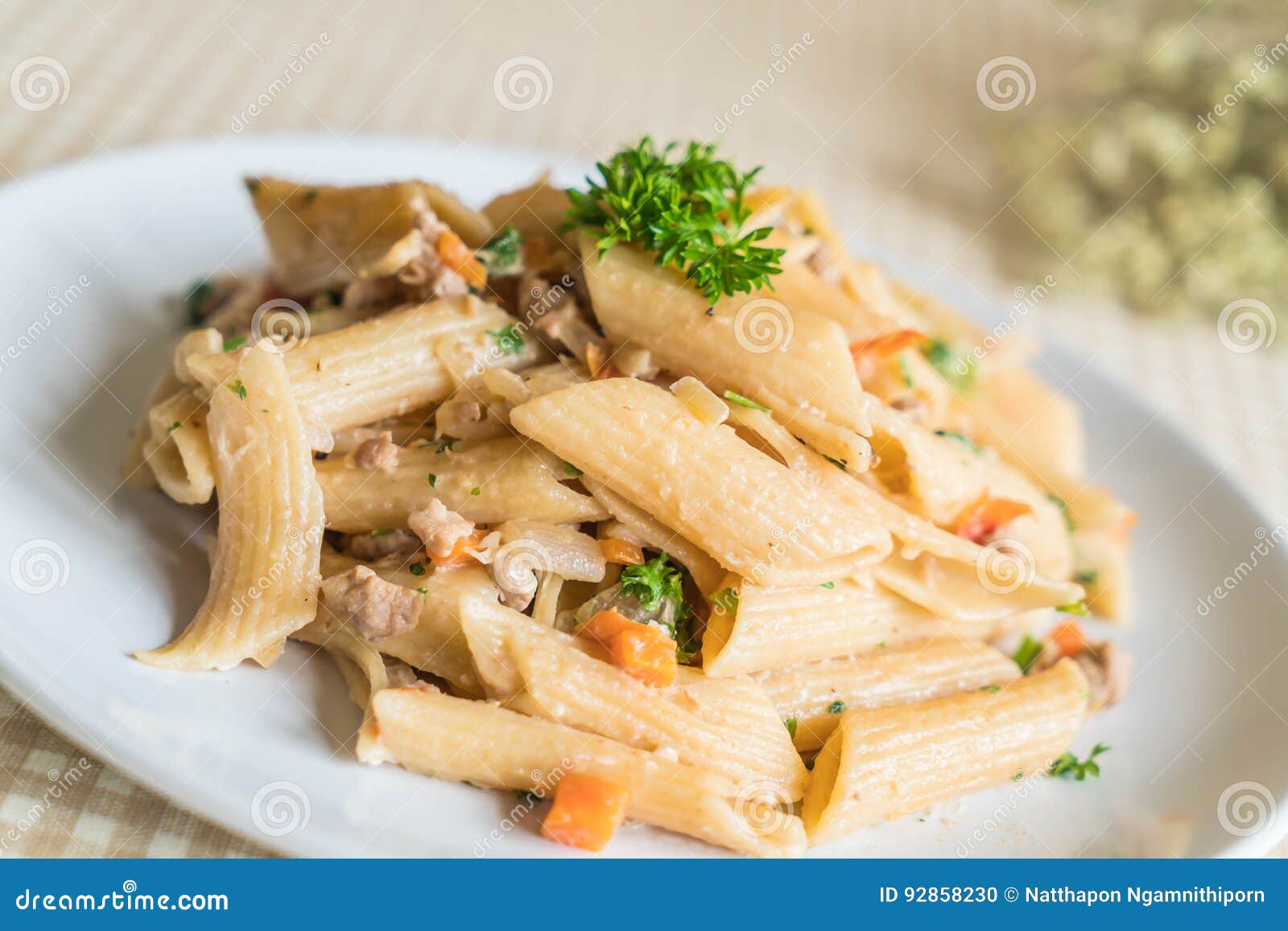 Penne pasta cream cheese stock photo. Image of plate 92858230