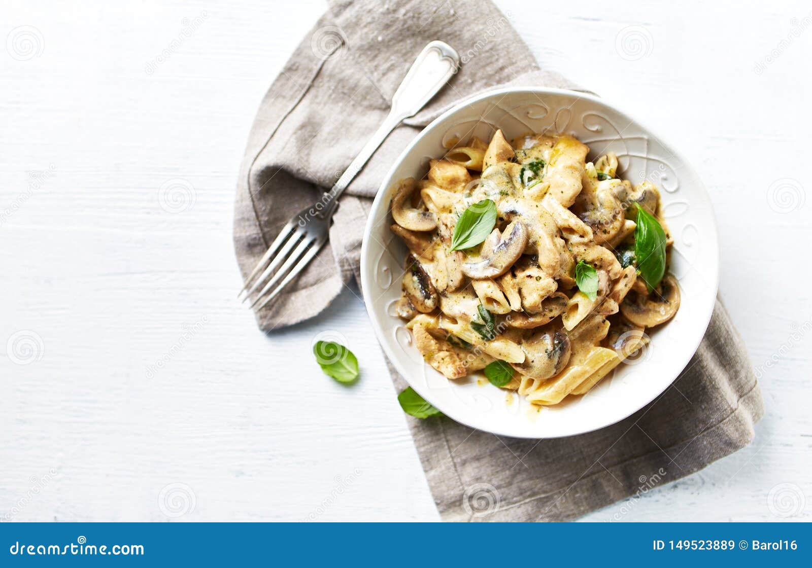 Penne Pasta with Mushrooms, Chicken, Spinach and Cream Sauce