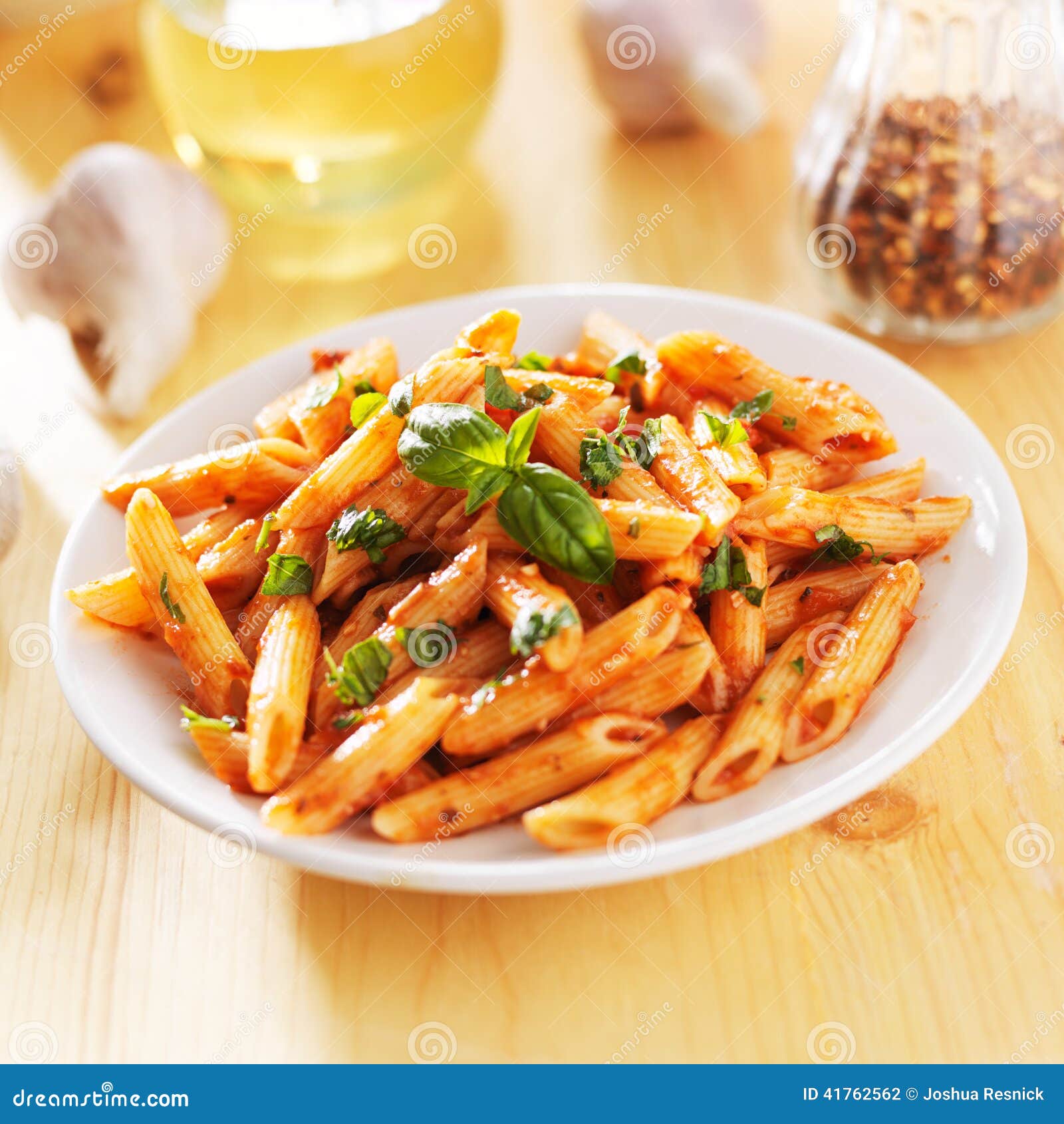 Penne Pasta in Tomato Sauce Stock Photo - Image of smothered, snack