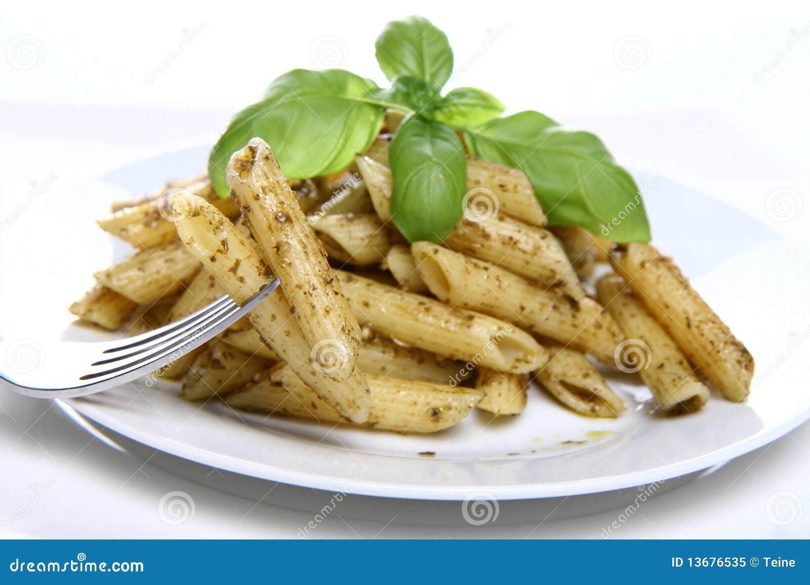 Penne with pesto stock image. Image of dinner, pasta - 13676535