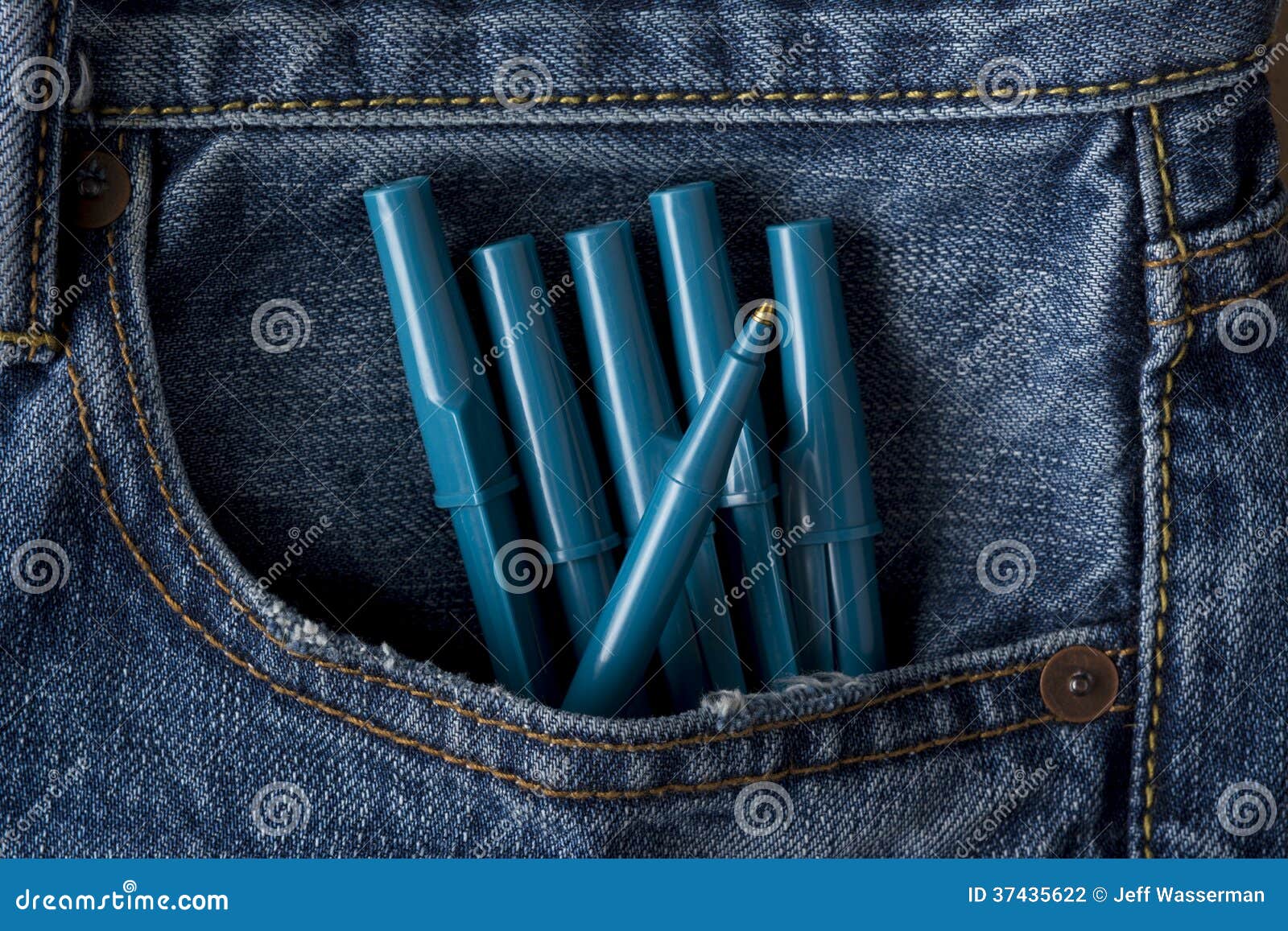 Pens in Blue Jeans Pocket stock photo. Image of clothing 37435622