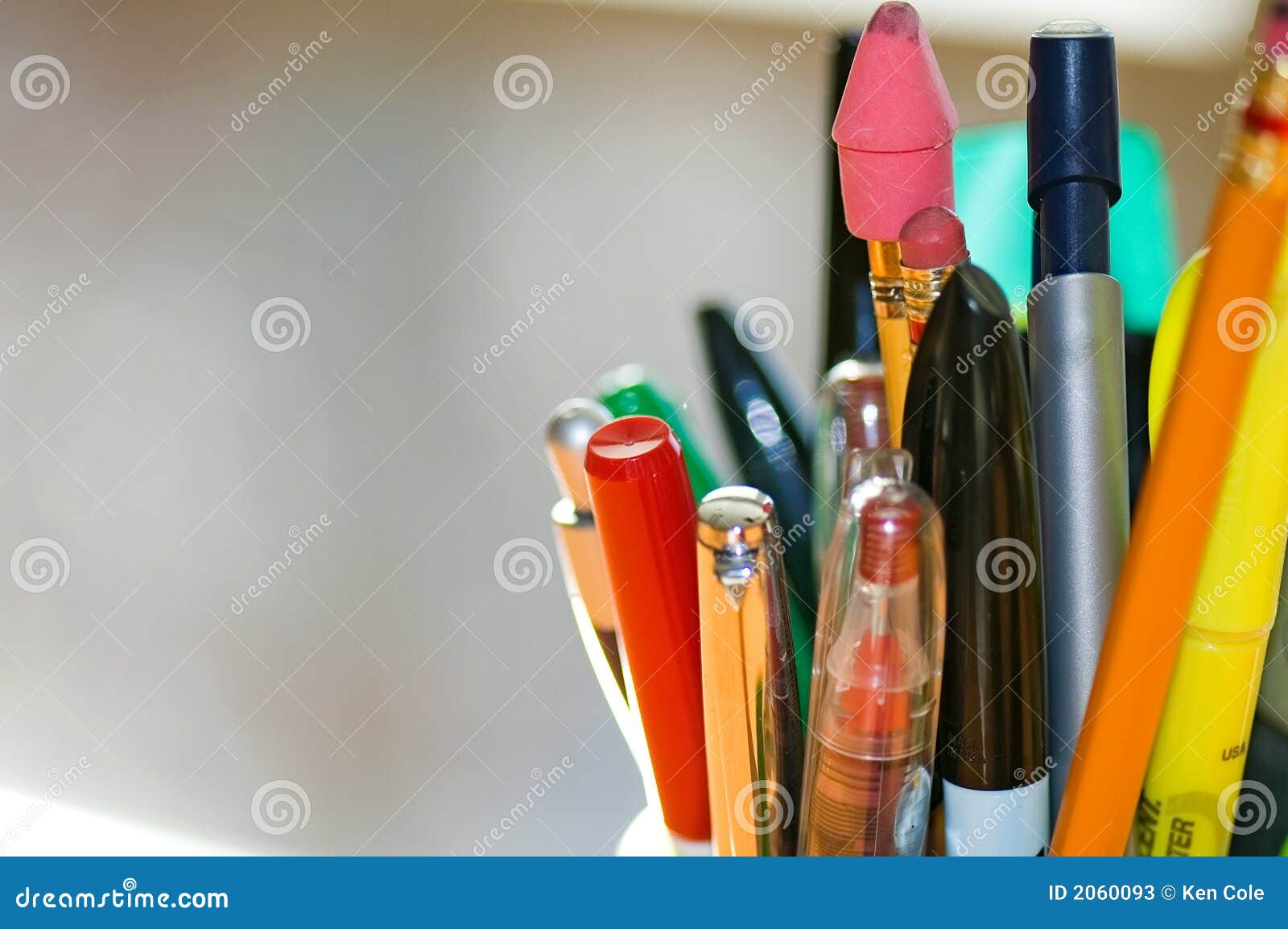 pens and pencils on desk