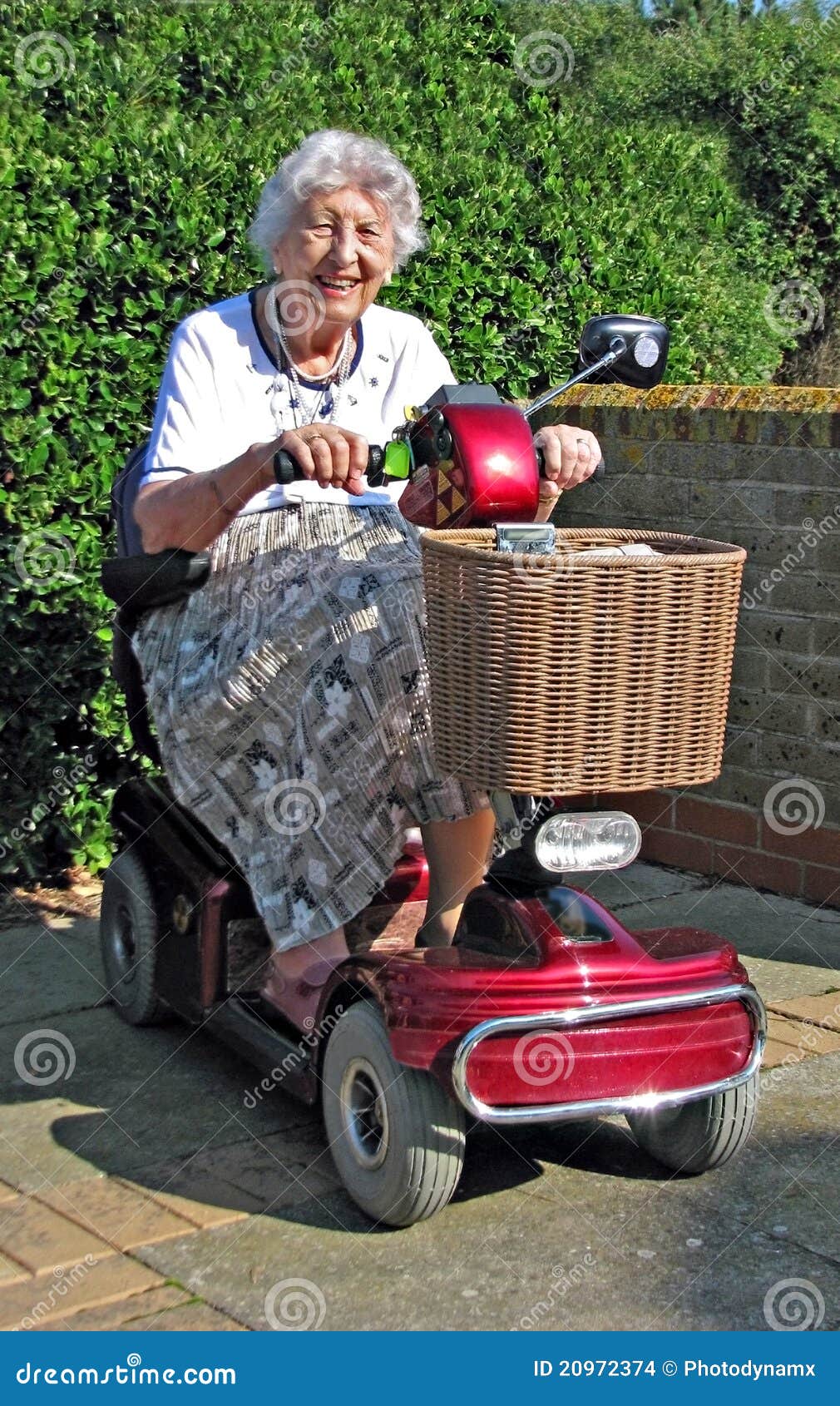 pensioner demonstrating mobility scooter power chair invalid freedom electric battery