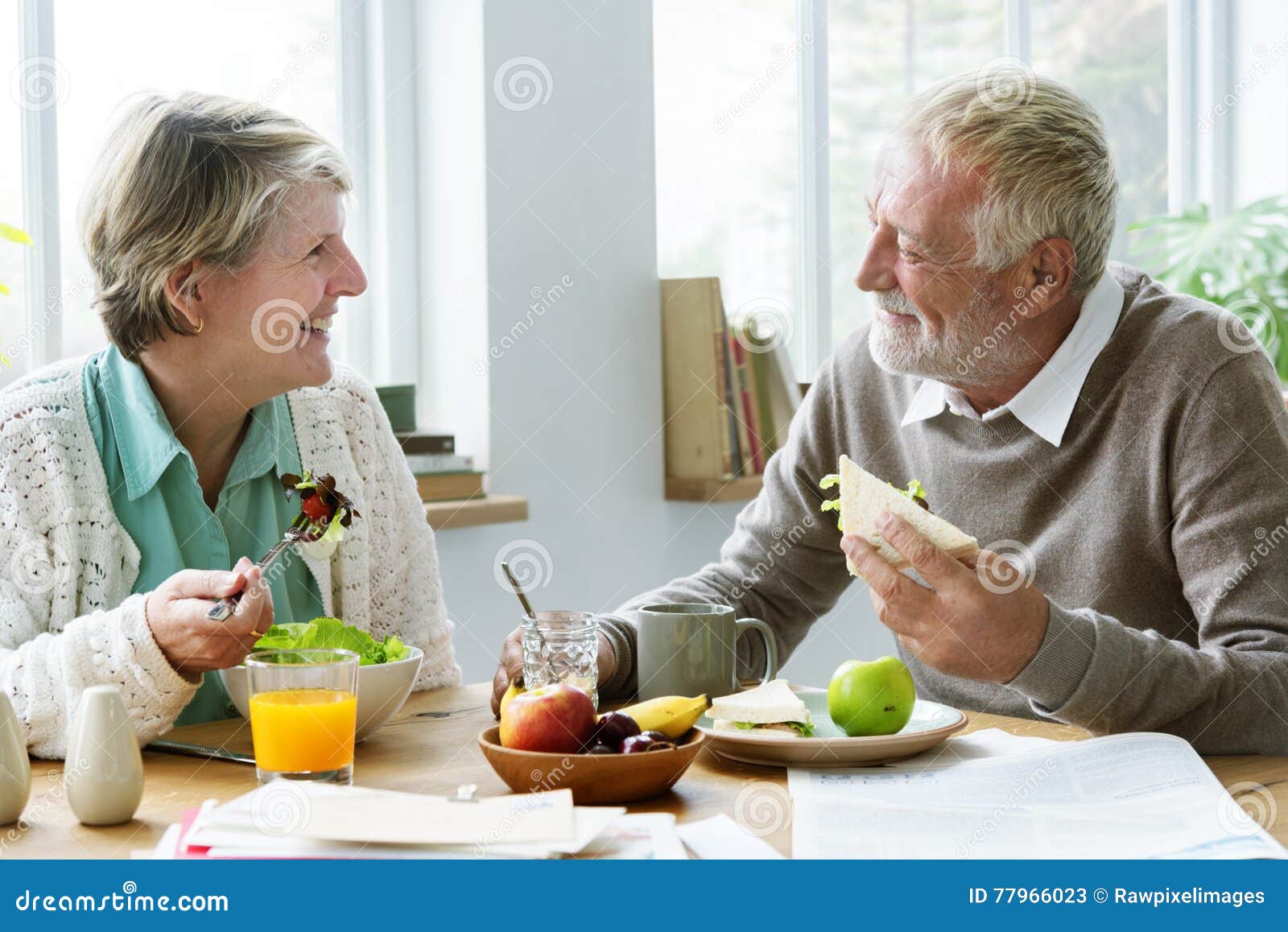 pensioner elderly couple eating brunch concept