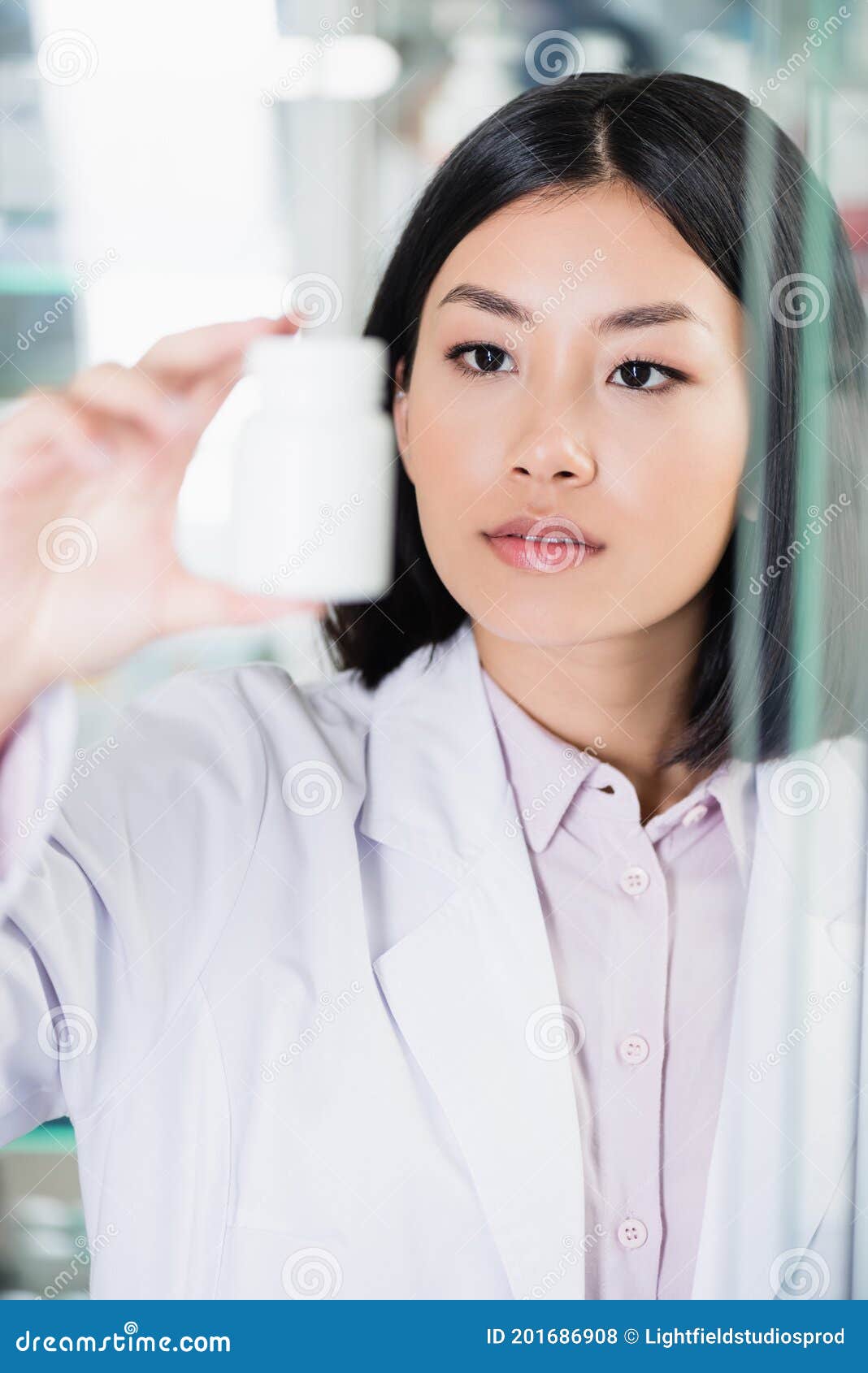 Asian Pharmacist in White Coat Looking Stock Photo - Image of health ...