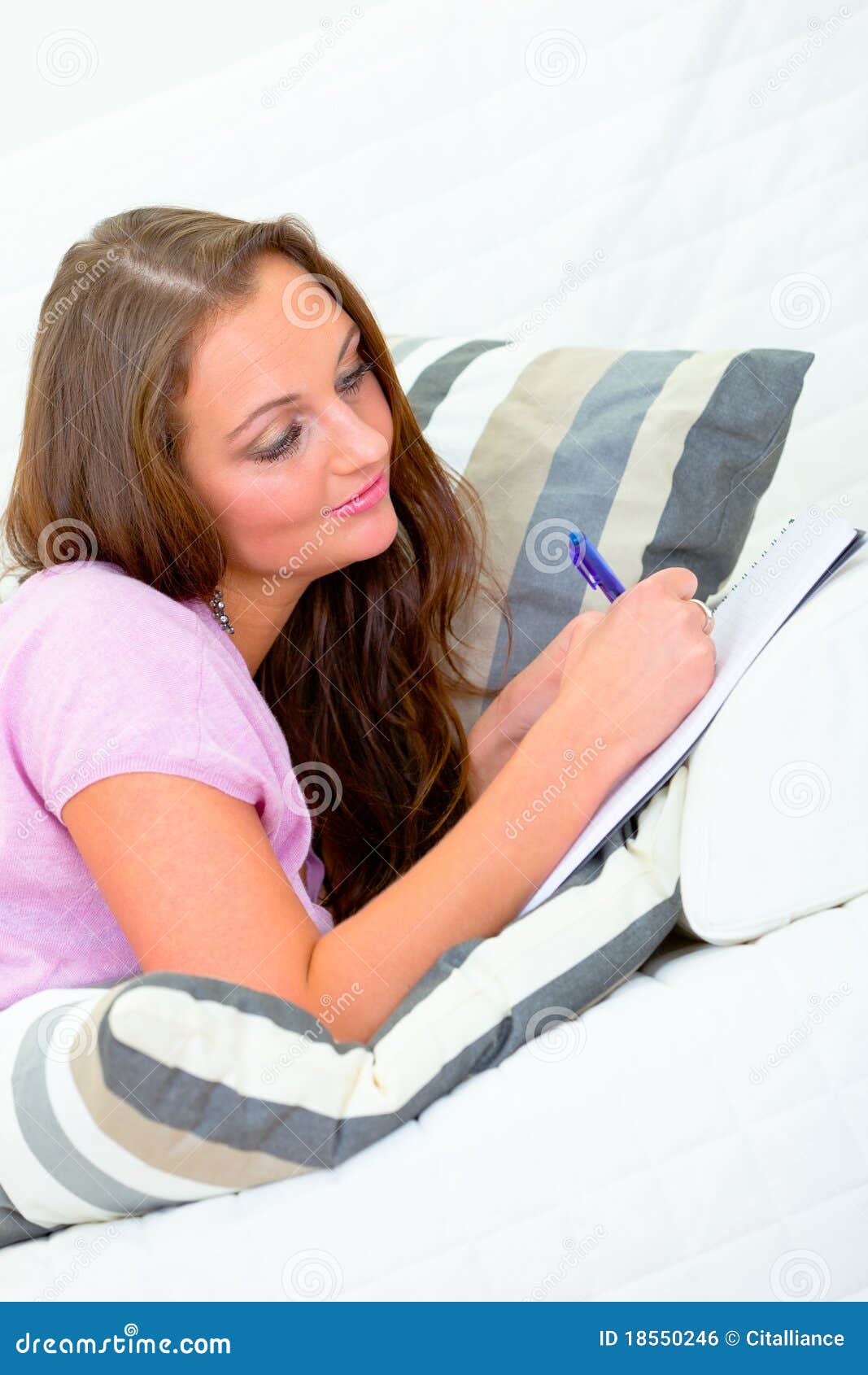 Pensive Woman on Sofa and Writing in Notebook Stock Photo Image of