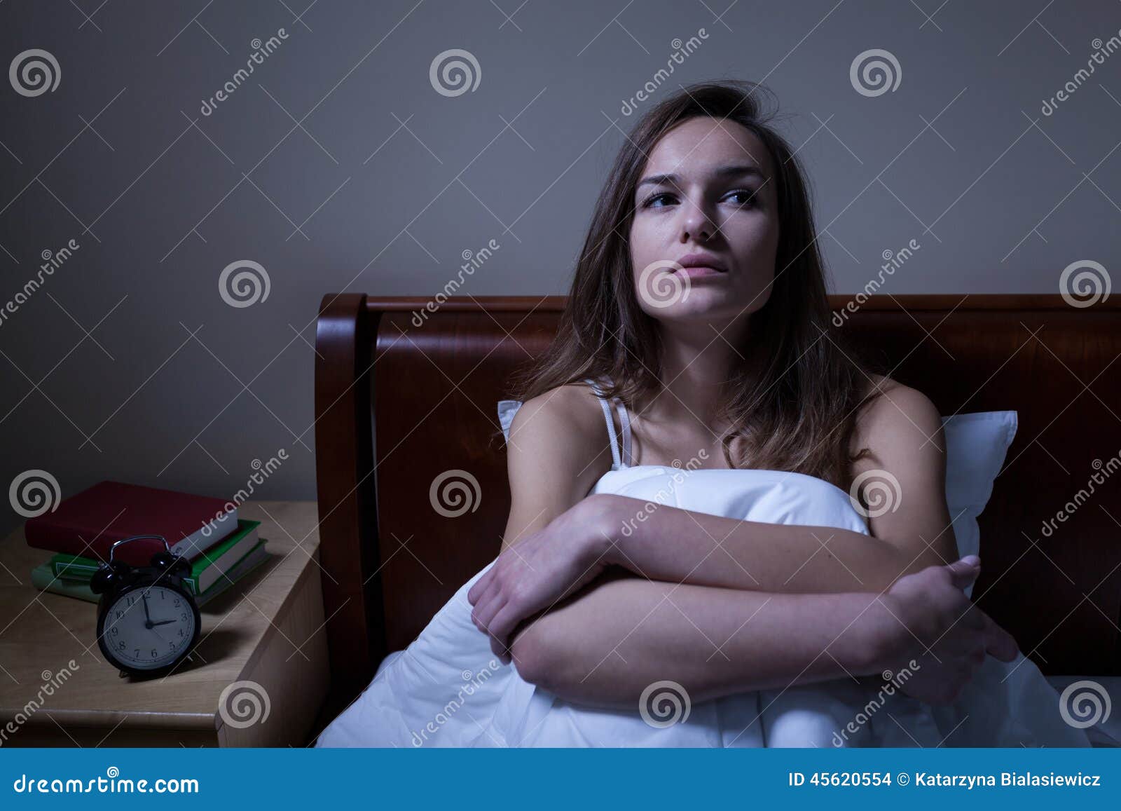 pensive woman stying sleepless at night