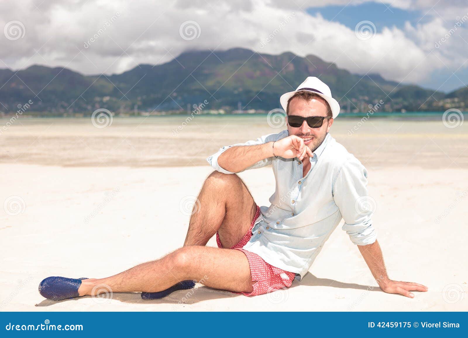 Pensive Young Man Sitting on the Beach Stock Image - Image of island ...