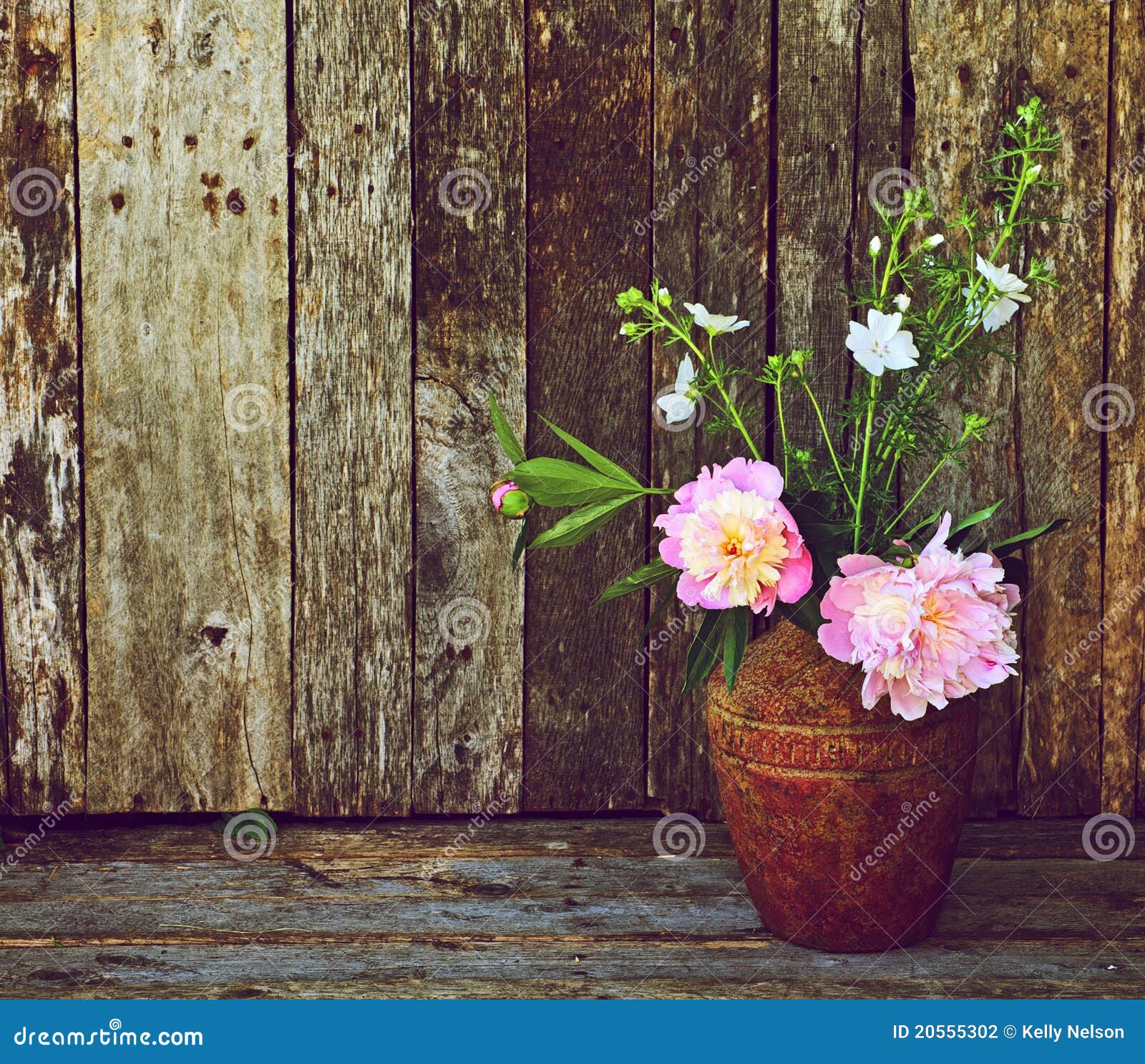 Peony Flowers in Vase on Wood. Stock Photo Image of texture, pottery