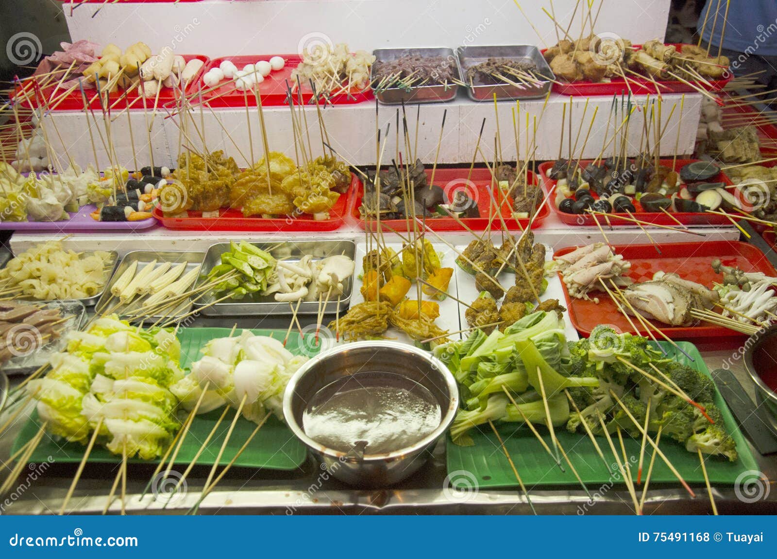 People Buy and Cook Lok Lok Food Malaysian Style at Restaurant Stock