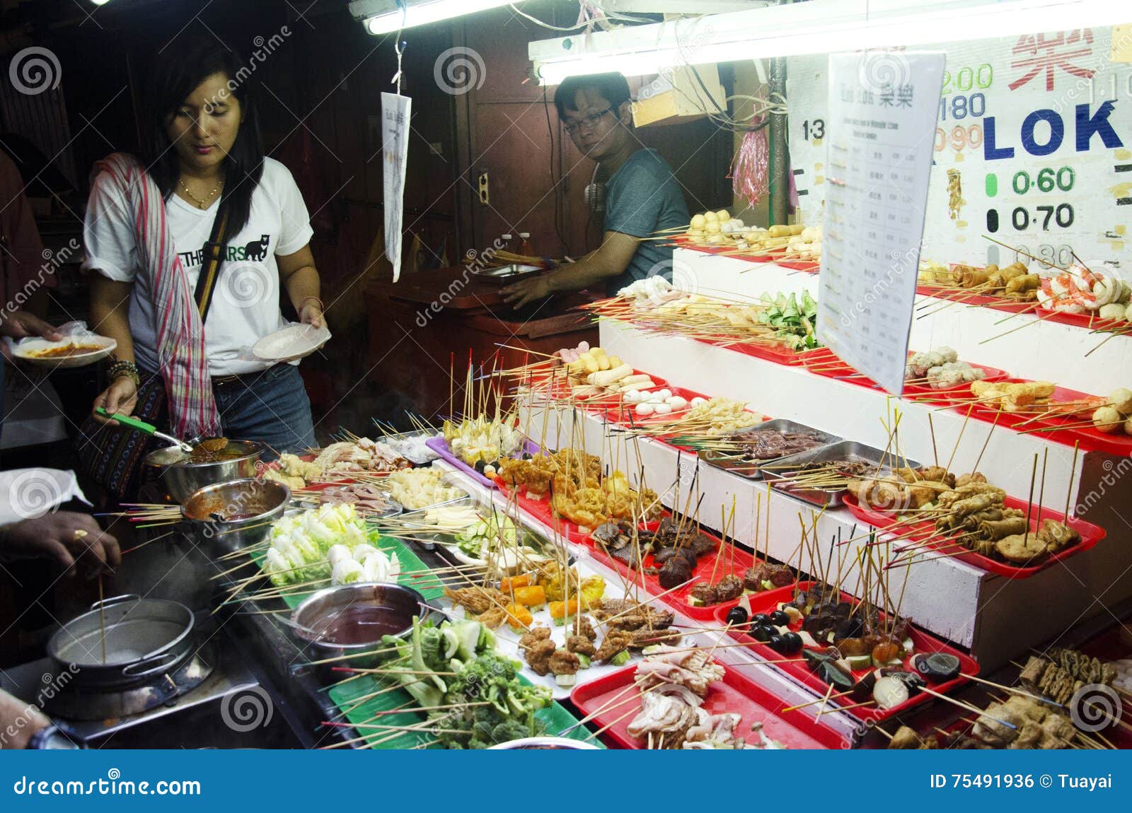 People Buy and Cook Lok Lok Food Malaysian Style at Restaurant
