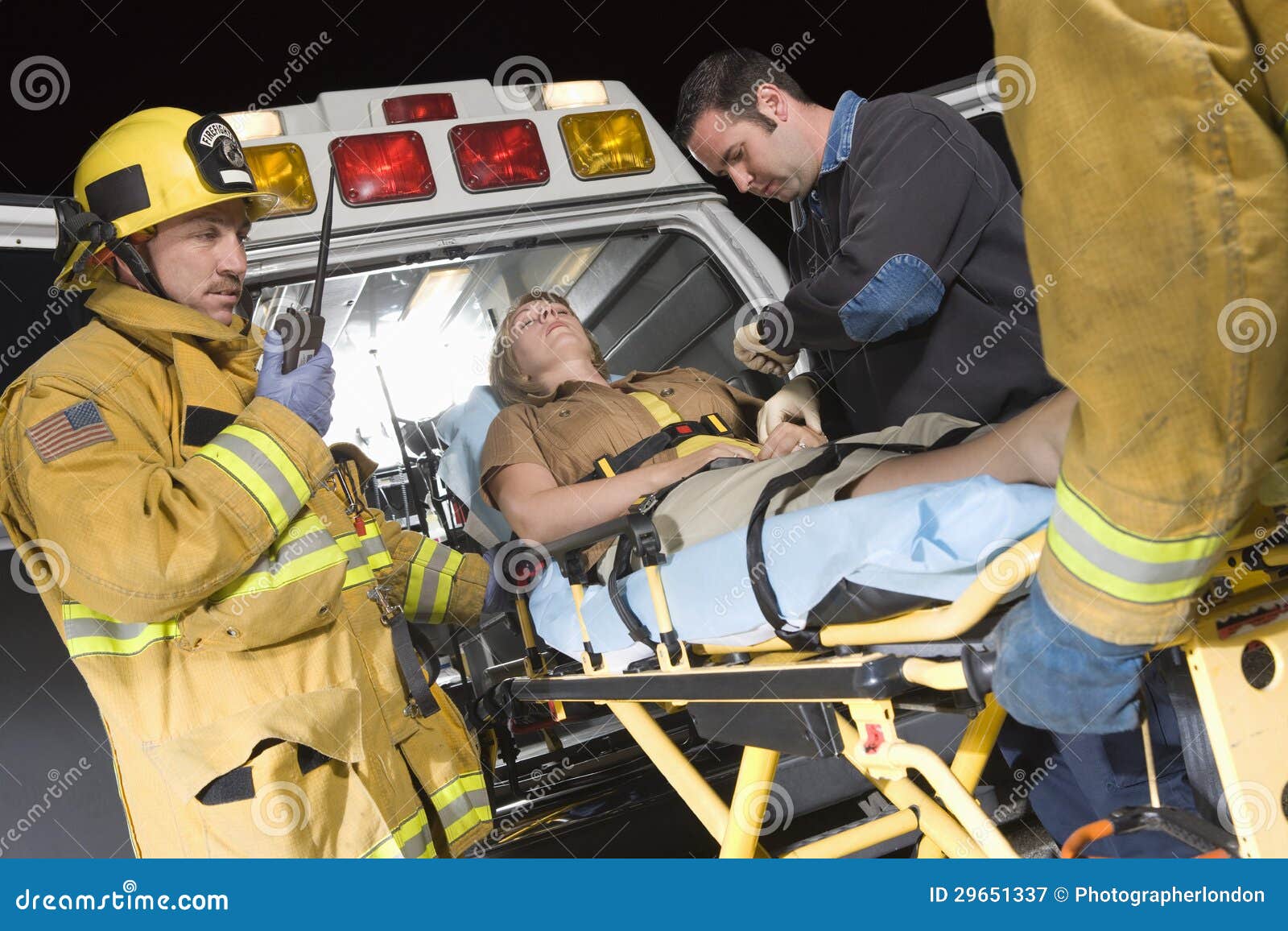 People Carrying Patient on Stretcher in Ambulance Stock Image Image