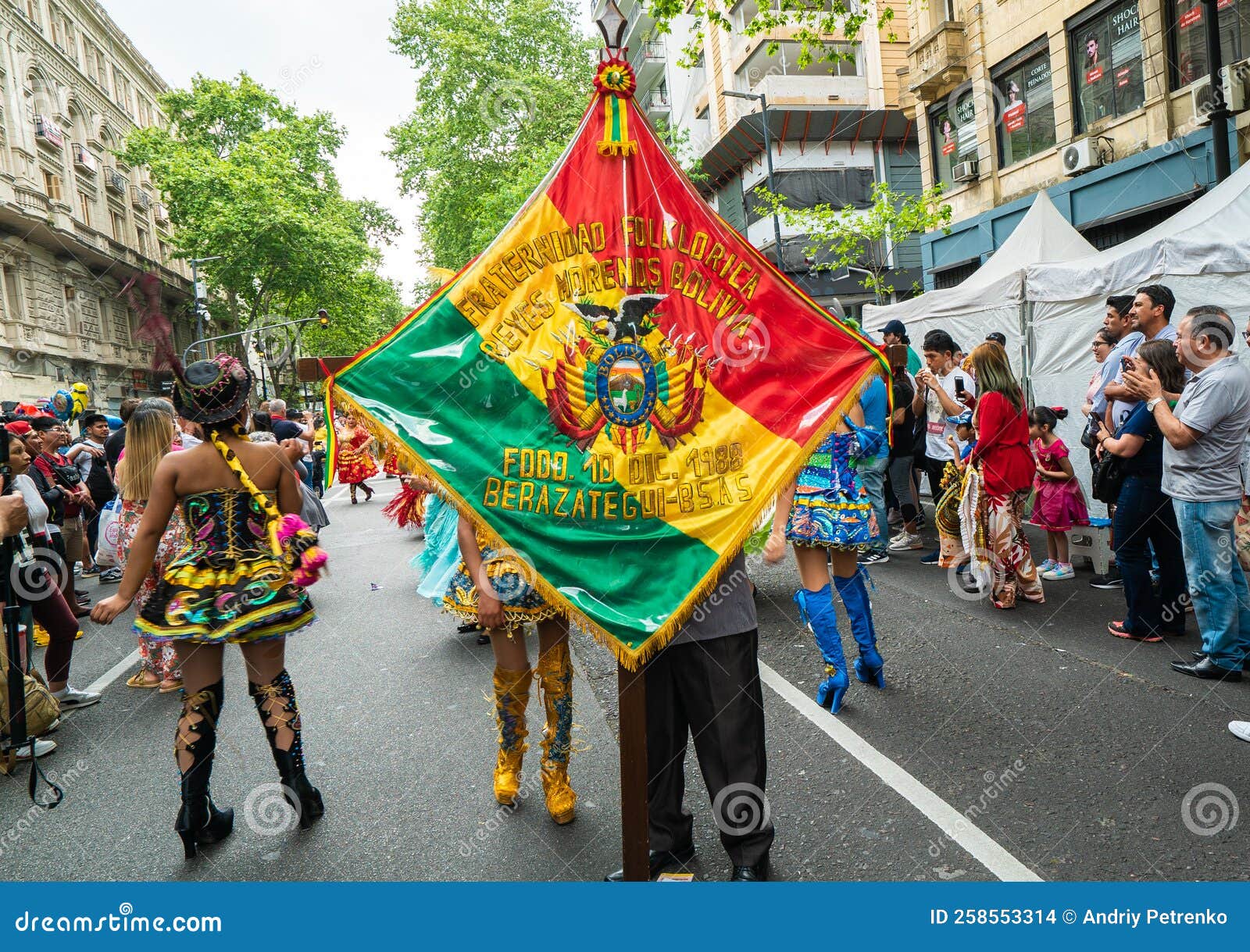 People with Colorful Flags in Transnational Costumes Celebrate the People with Colorful Flags in Transnational Costumes Celebrate the