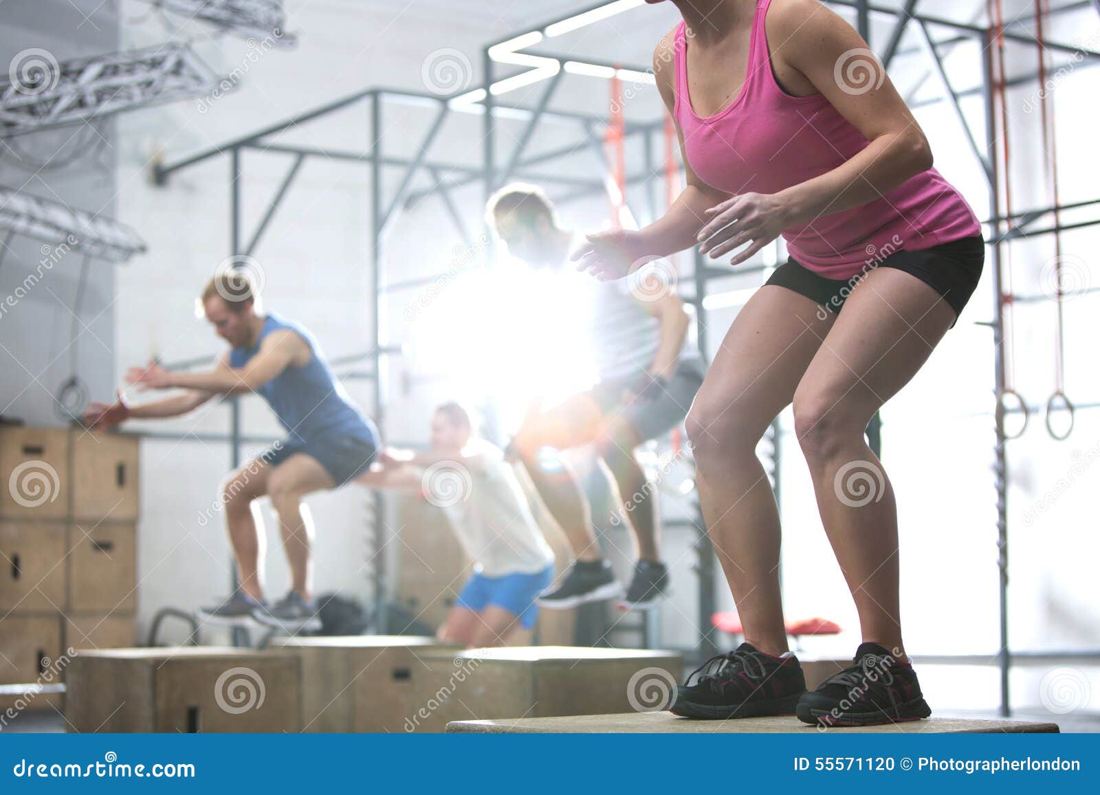 People Doing Box Jump Exercise in Crossfit Gym Stock Photo Image of