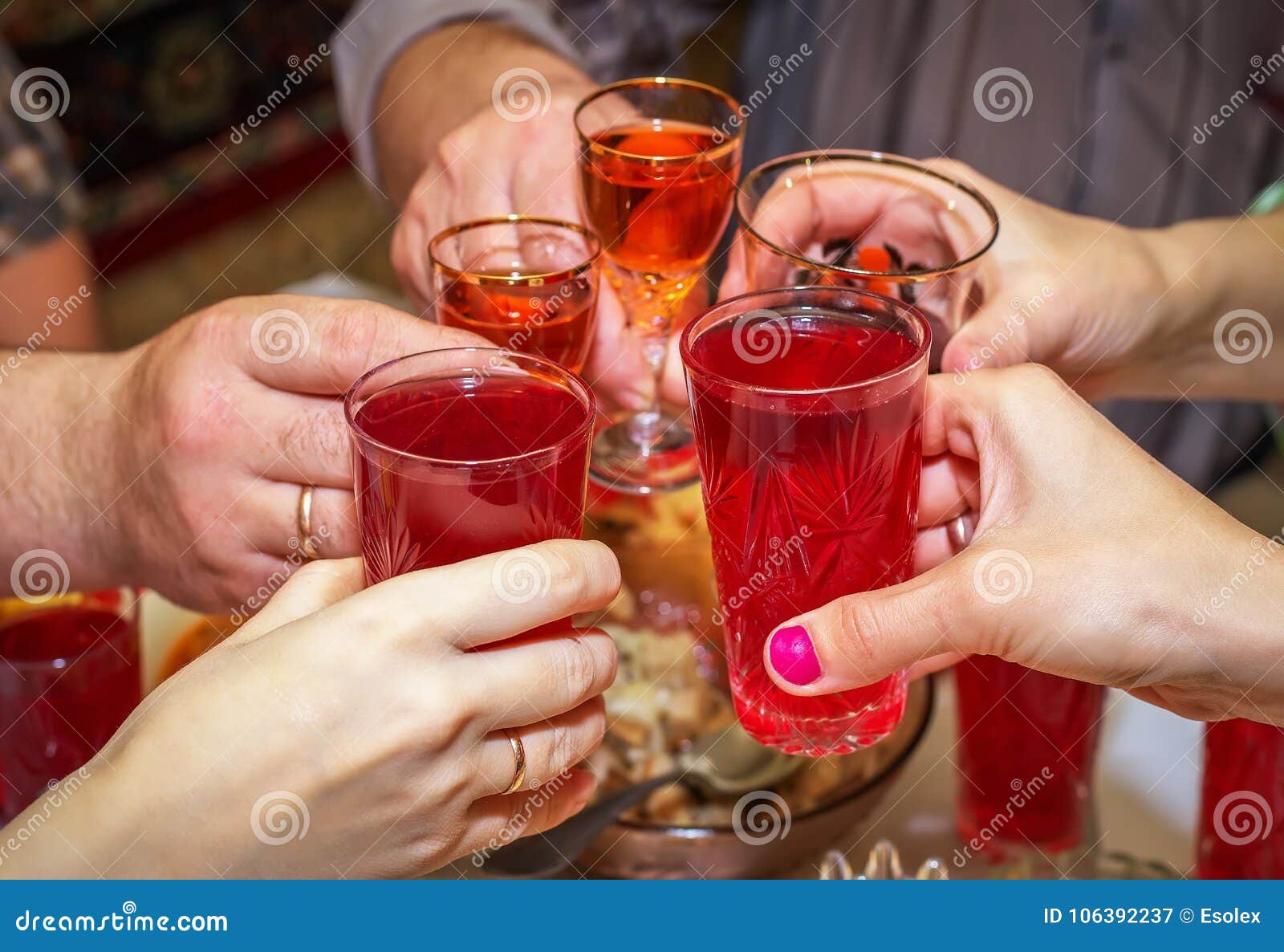 People Drink at the Table, Clink Glasses. Stock Image Image of