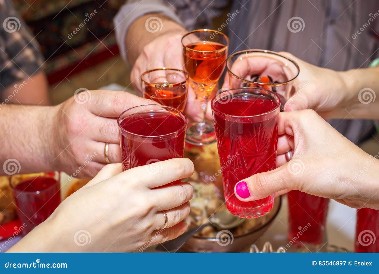 People Drink at the Table, Clink Glasses. Stock Image Image of